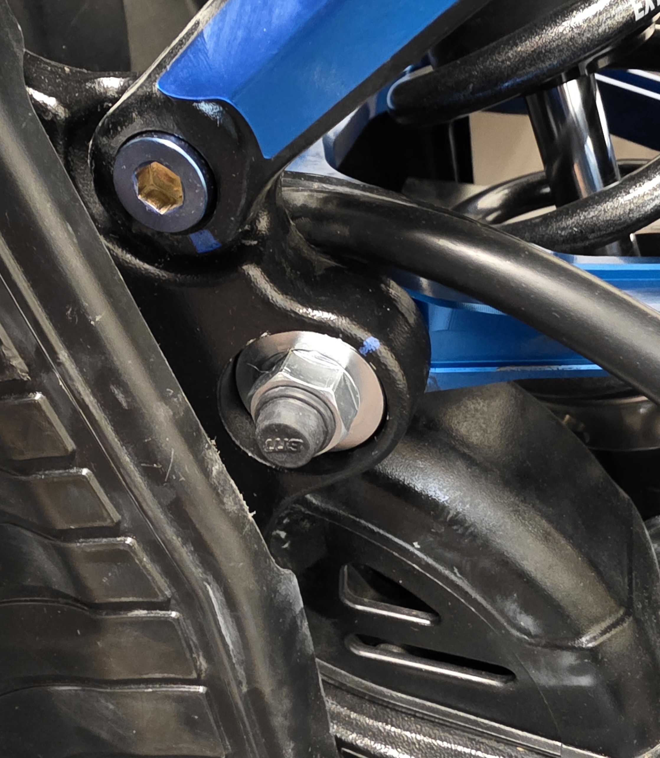 One-piece pivot bolt replacing multi-piece OEM Ultra Bee hardware