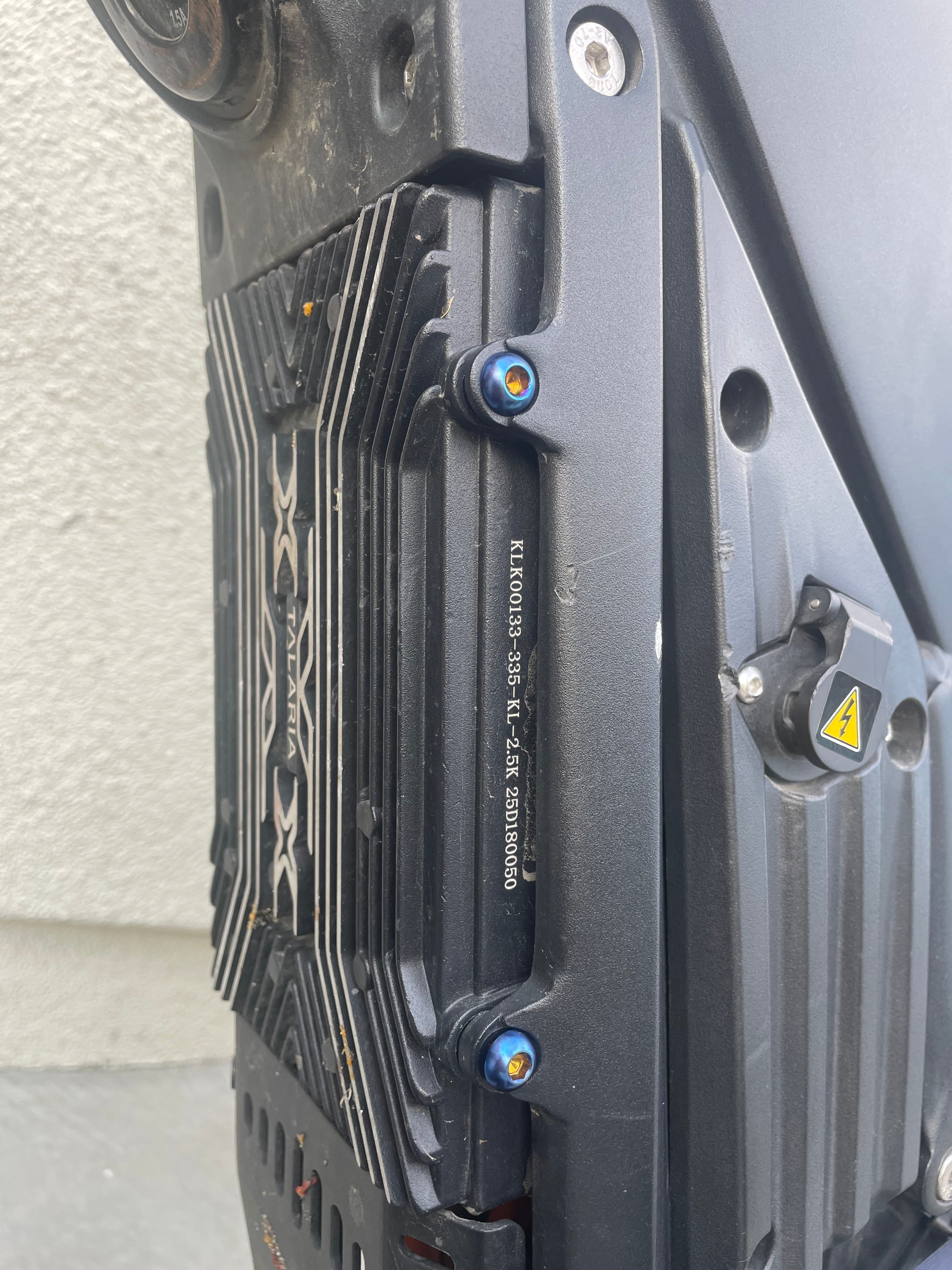 Close-up of titanium controller mount bolt threading