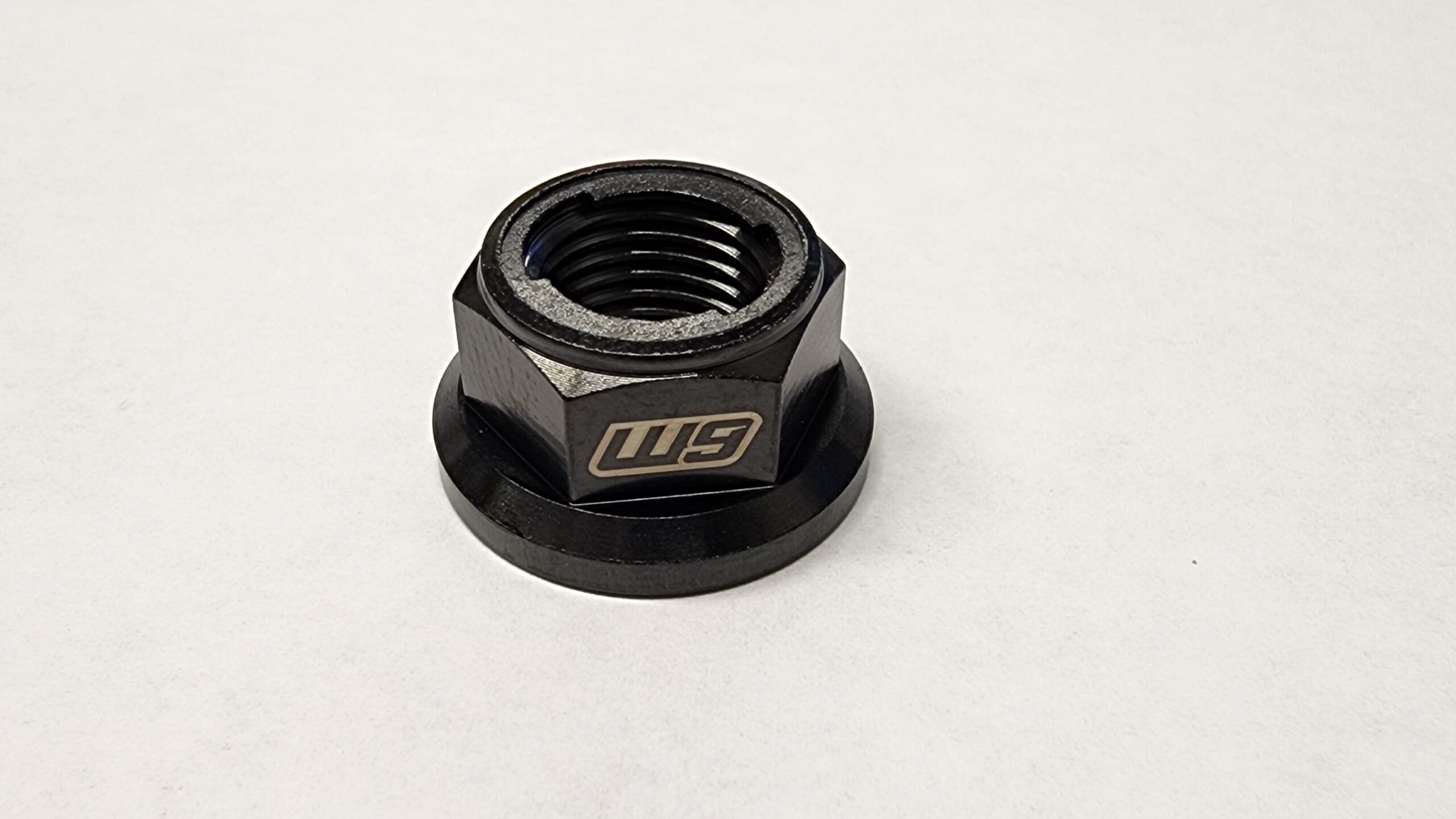 Warp 9 aerospace-grade titanium motor nut for Sur-Ron Light Bee LBX and EBMX motors