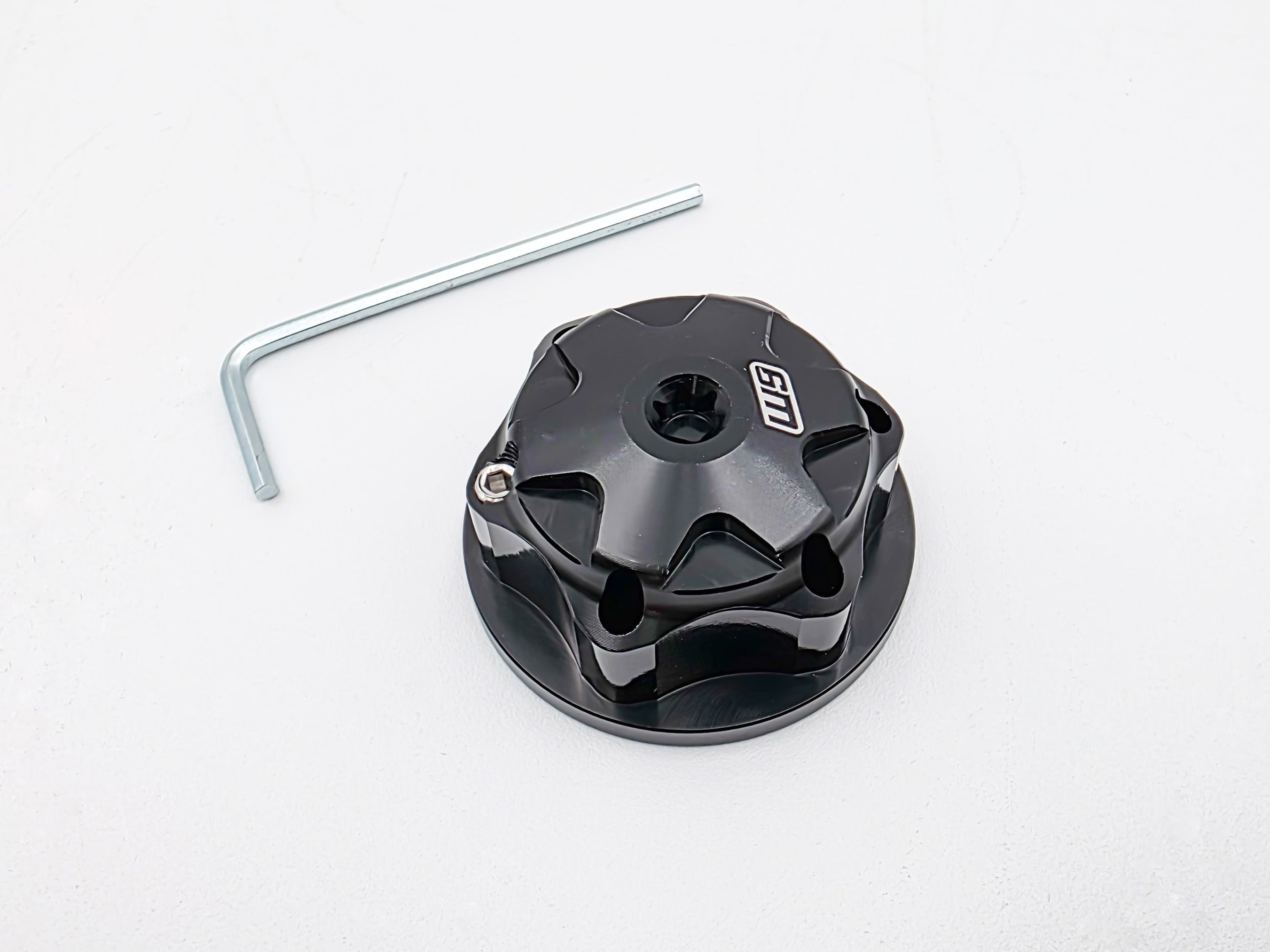 Top view of the CNC aluminum steering cap nut on an Altis Sigma front end