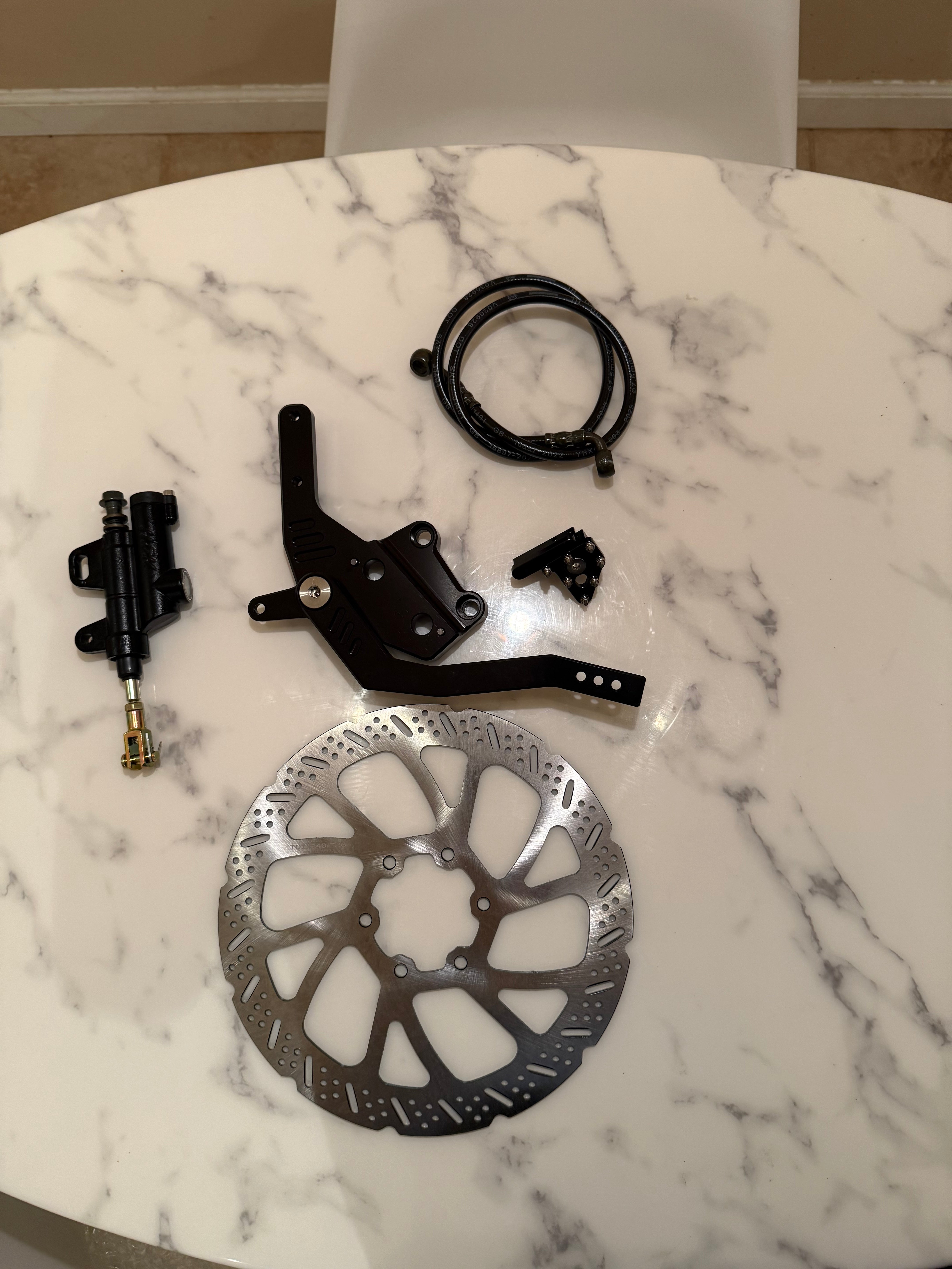 Moto foot brake kit for Talaria XXX — close-up