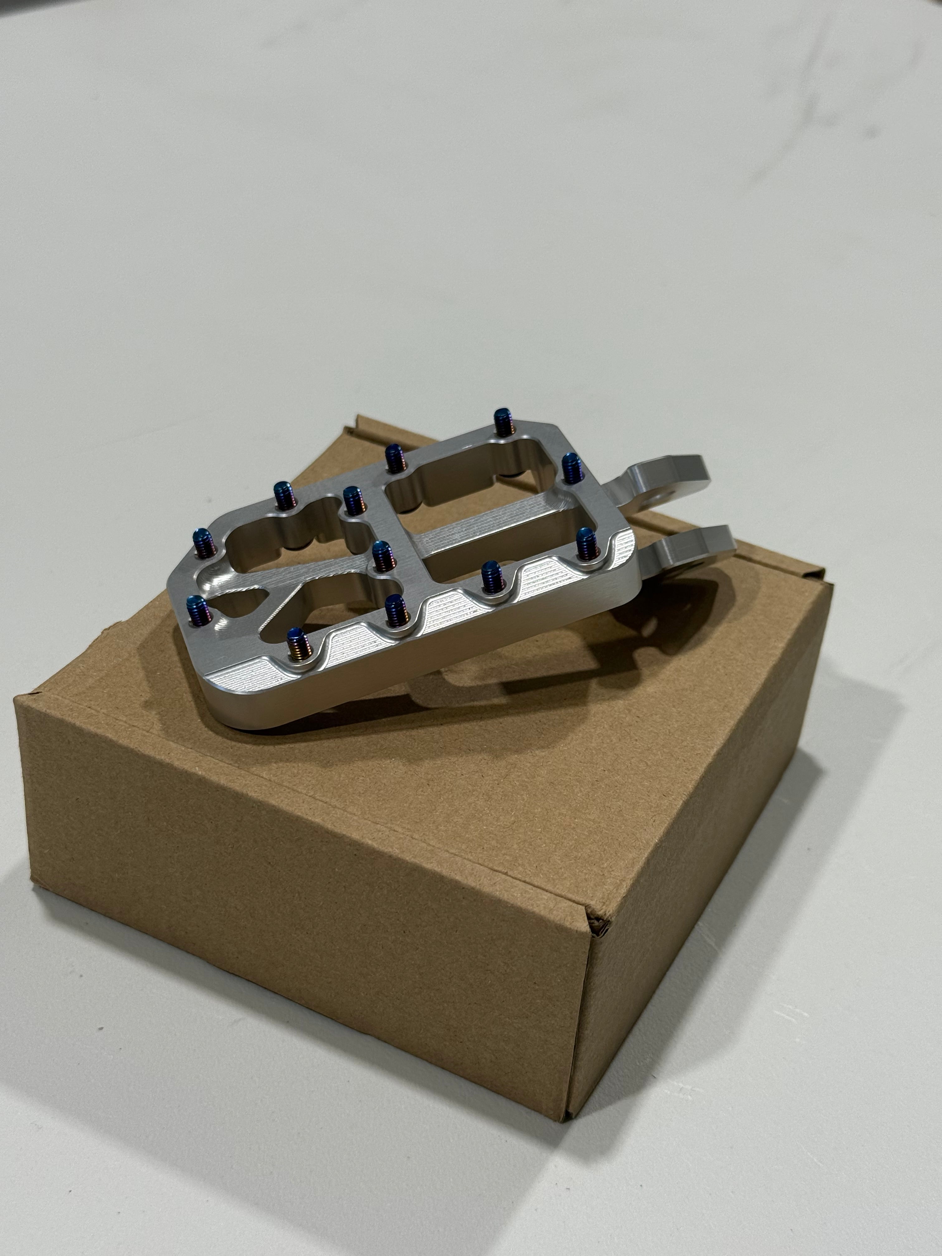 CNC-machined foot peg platform top-down detail