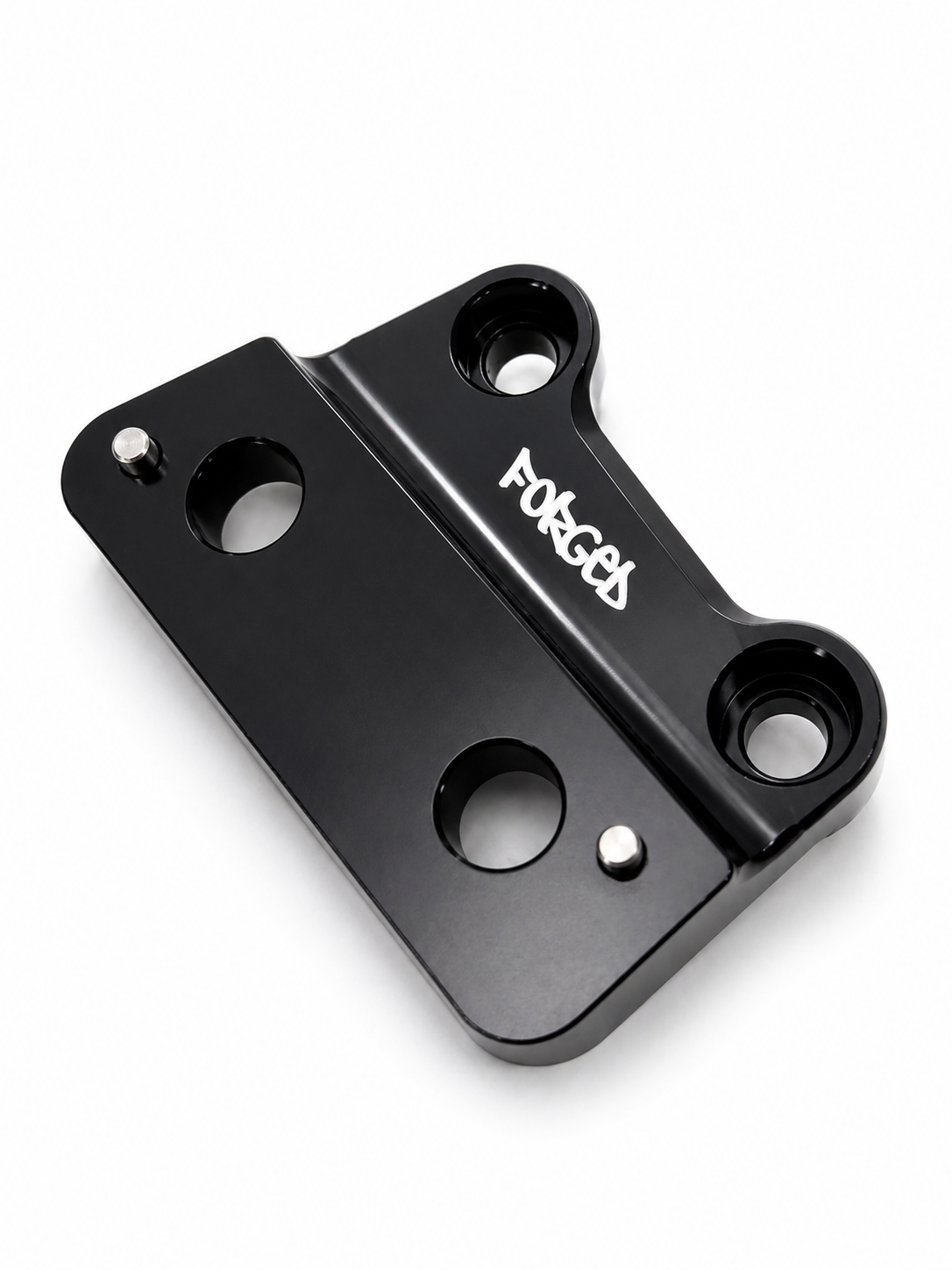 Foot brackets bolted onto a Talaria XXX frame