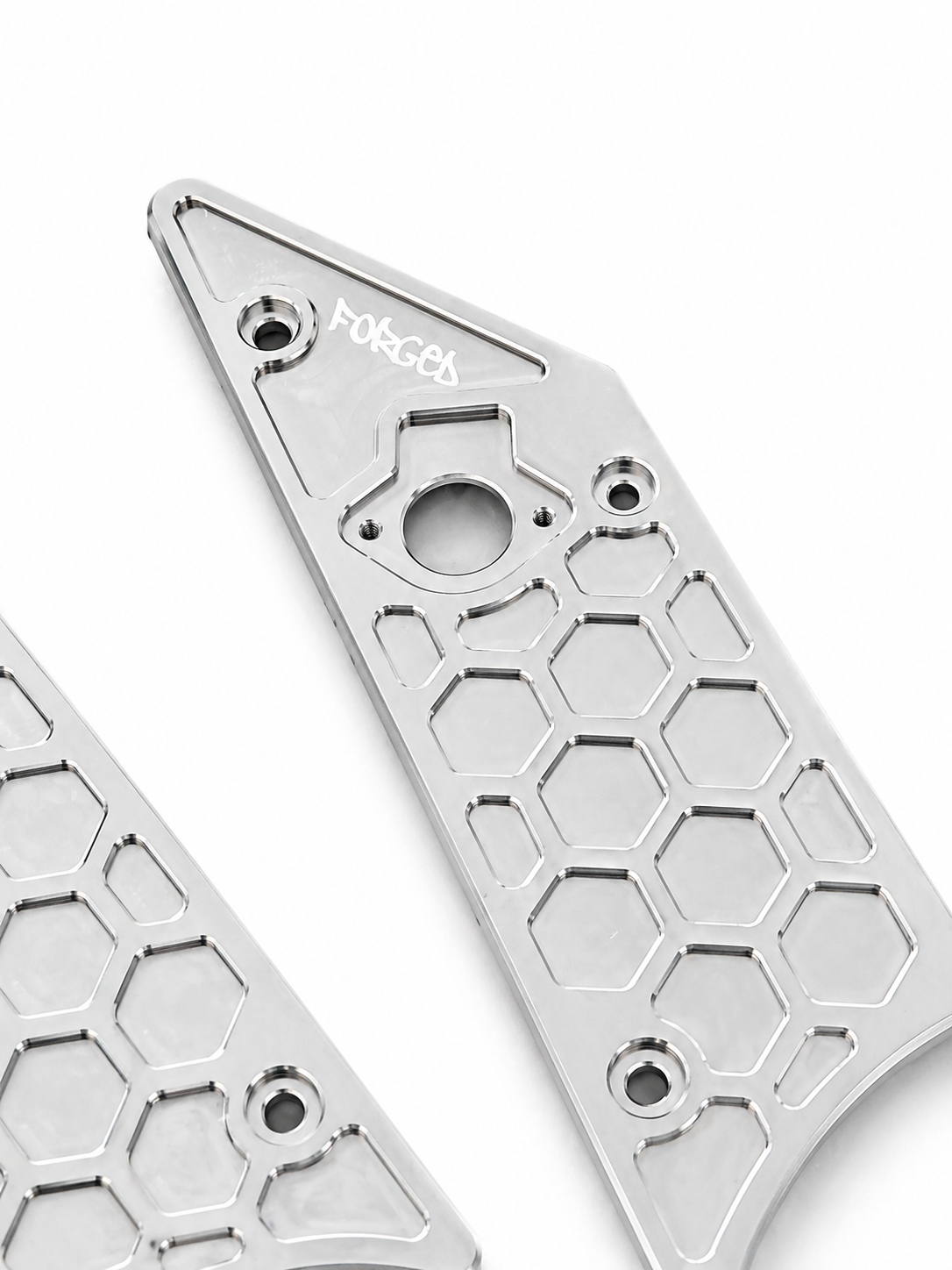Bolt-on metal side panels installed on a Talaria XXX electric dirt bike