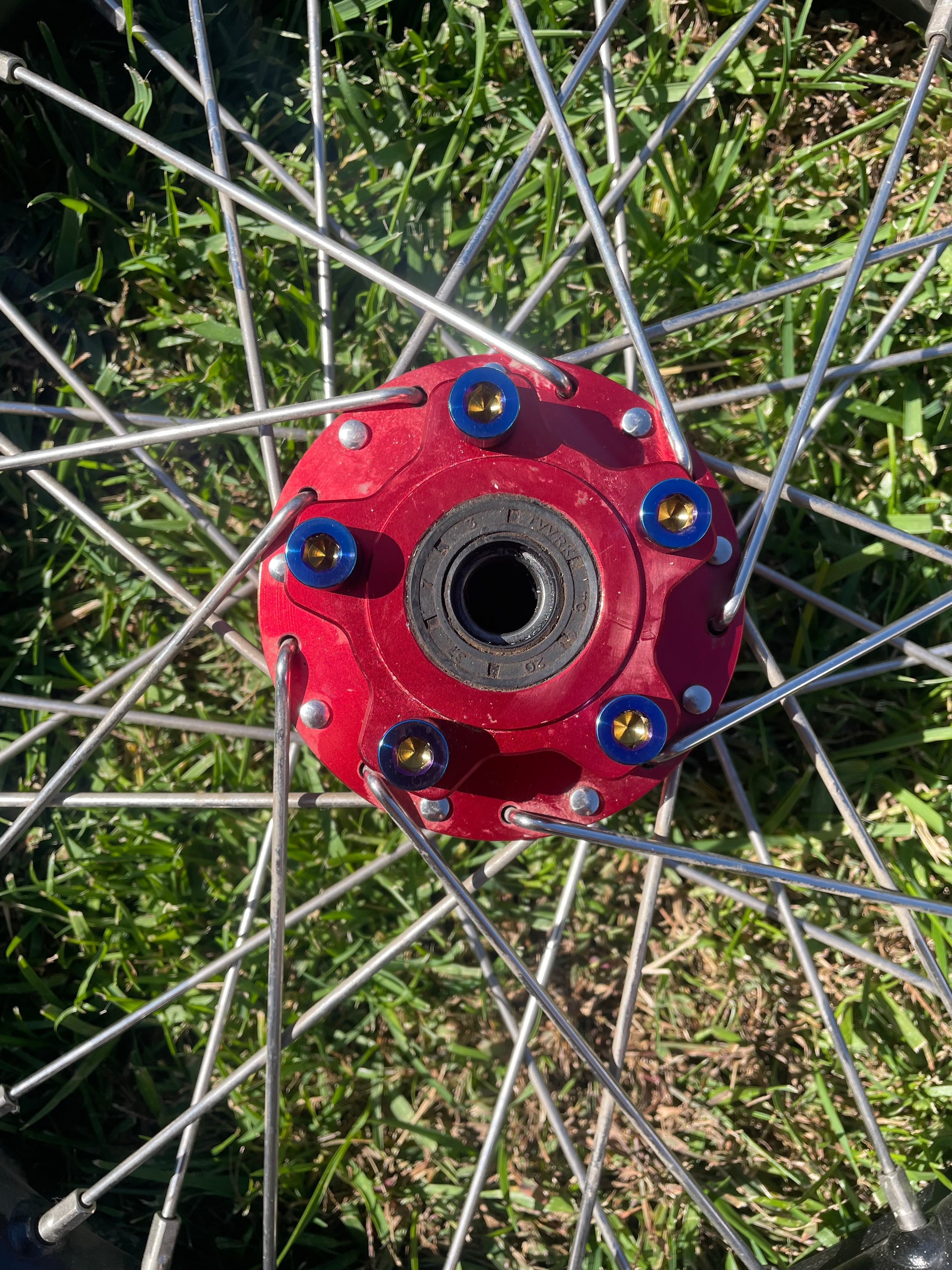 Close-up of titanium sprocket bolt threading and finish
