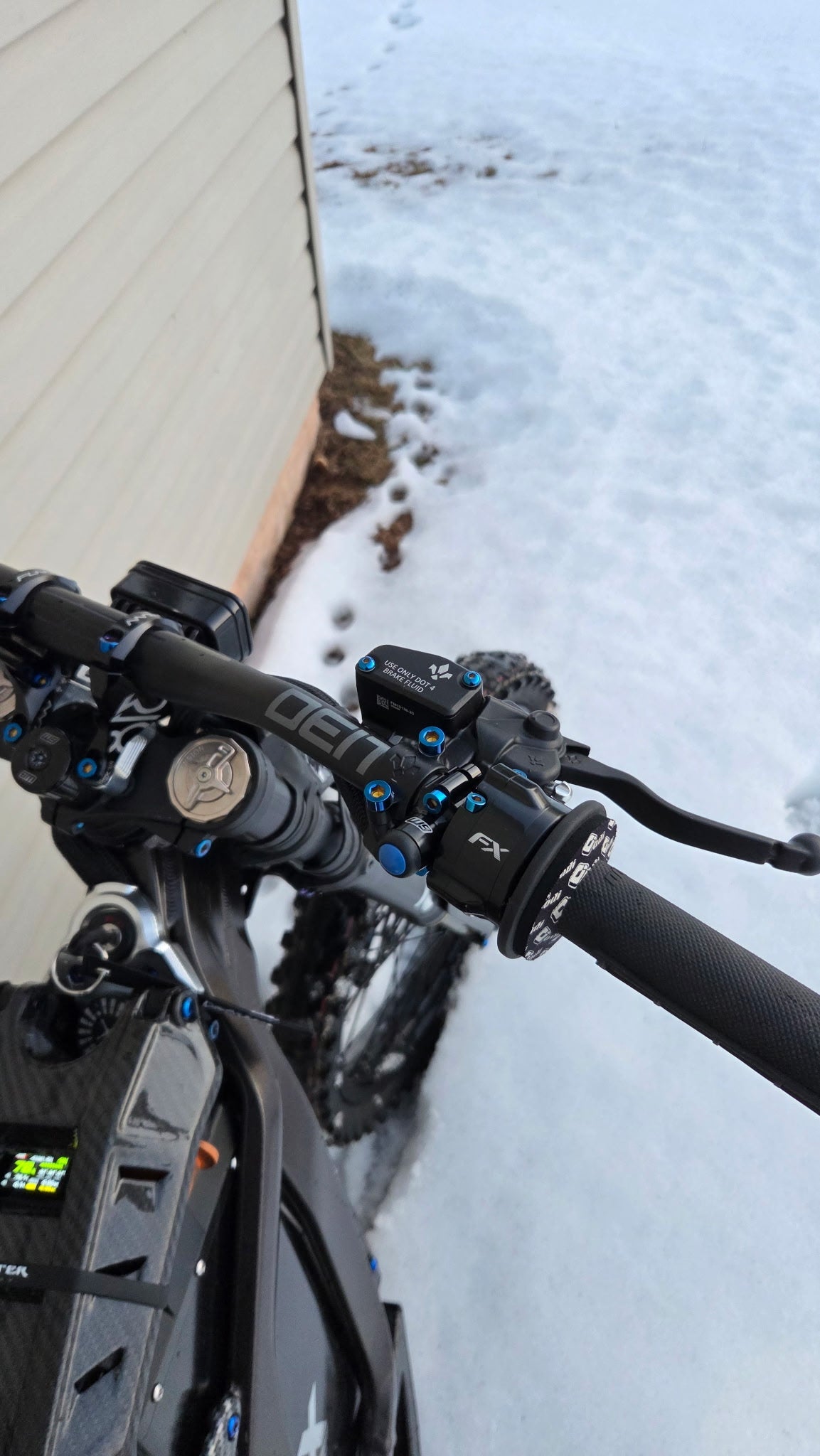 Close-up of titanium throttle bolts for Sur-Ron and Talaria throttle housing