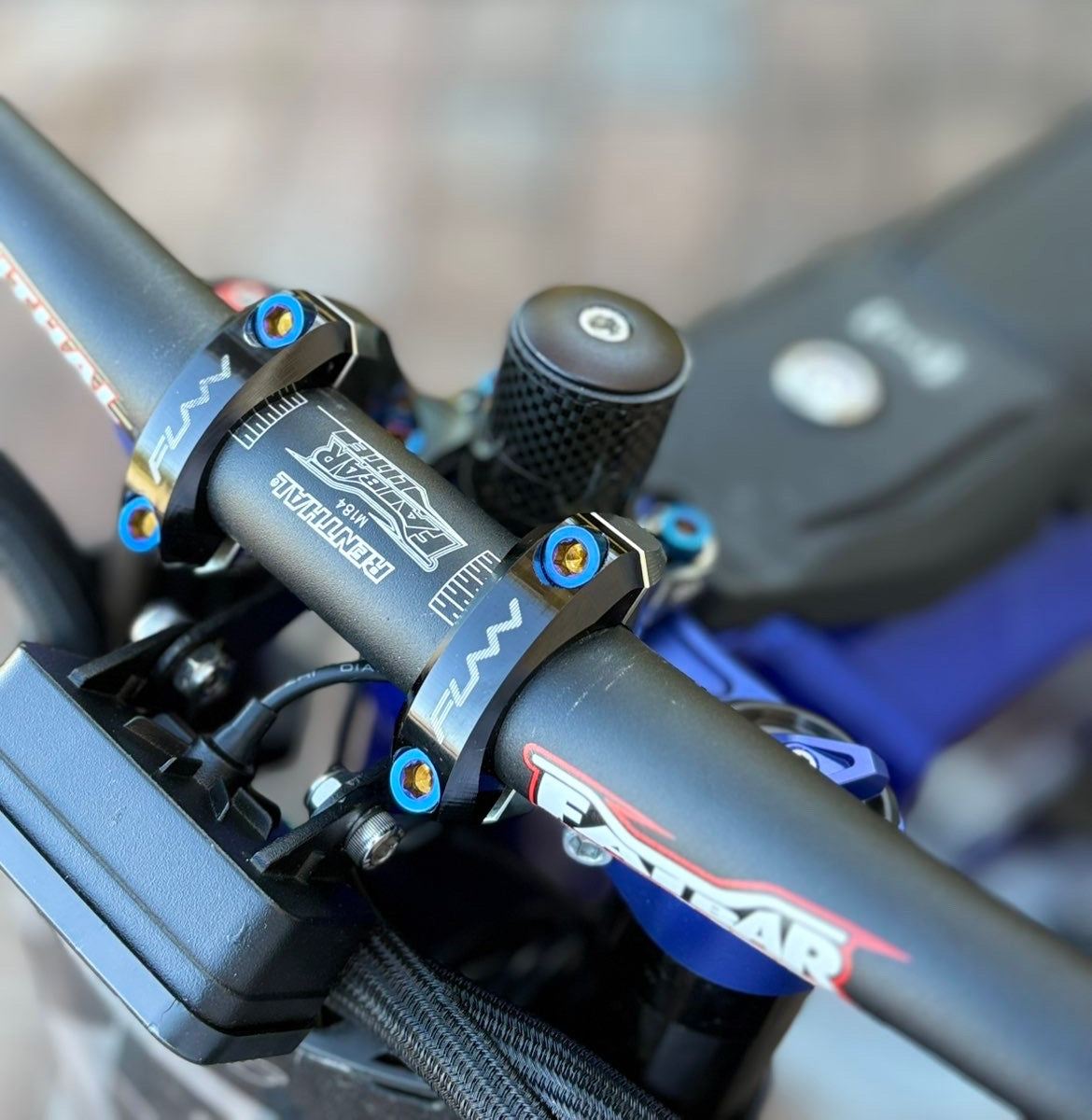 Funn direct mount upper titanium hardware installed on e-moto cockpit