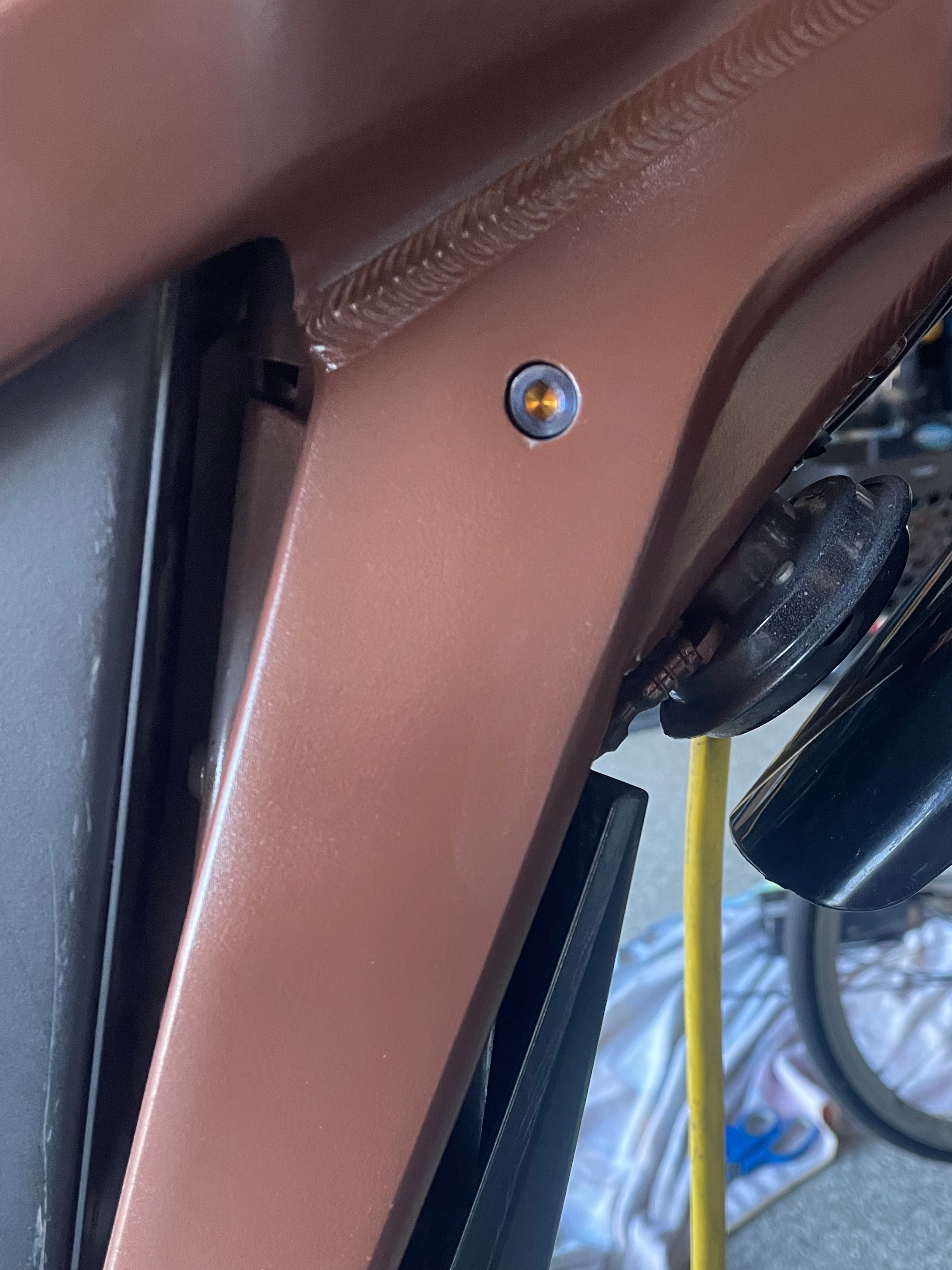 Titanium controller plate bolts installed on Sur-Ron