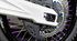 Warp 9 longer rear axle and custom blocks compared to OEM Talaria MX5 setup