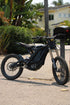 Reflective invisible wrap applied to an e-moto battery