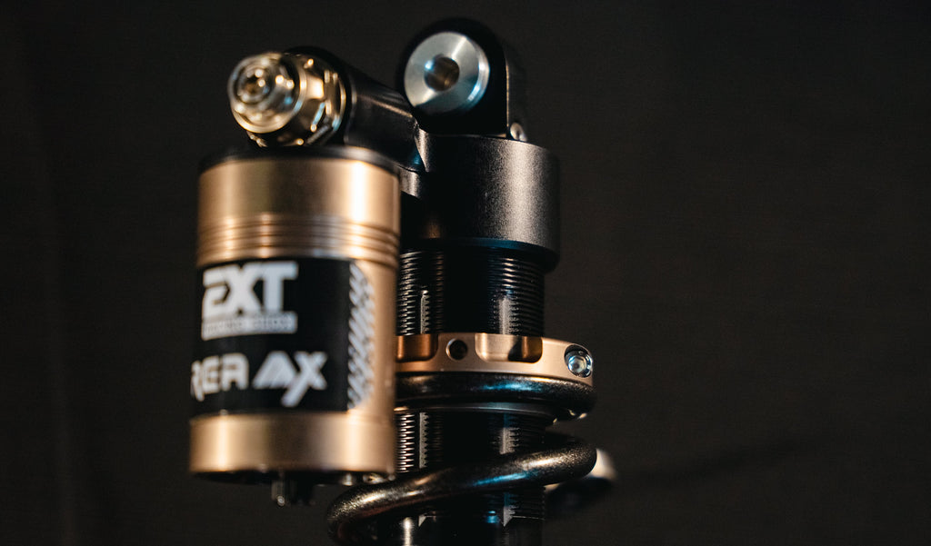EXT REA MX shock — HBC bottom-out control