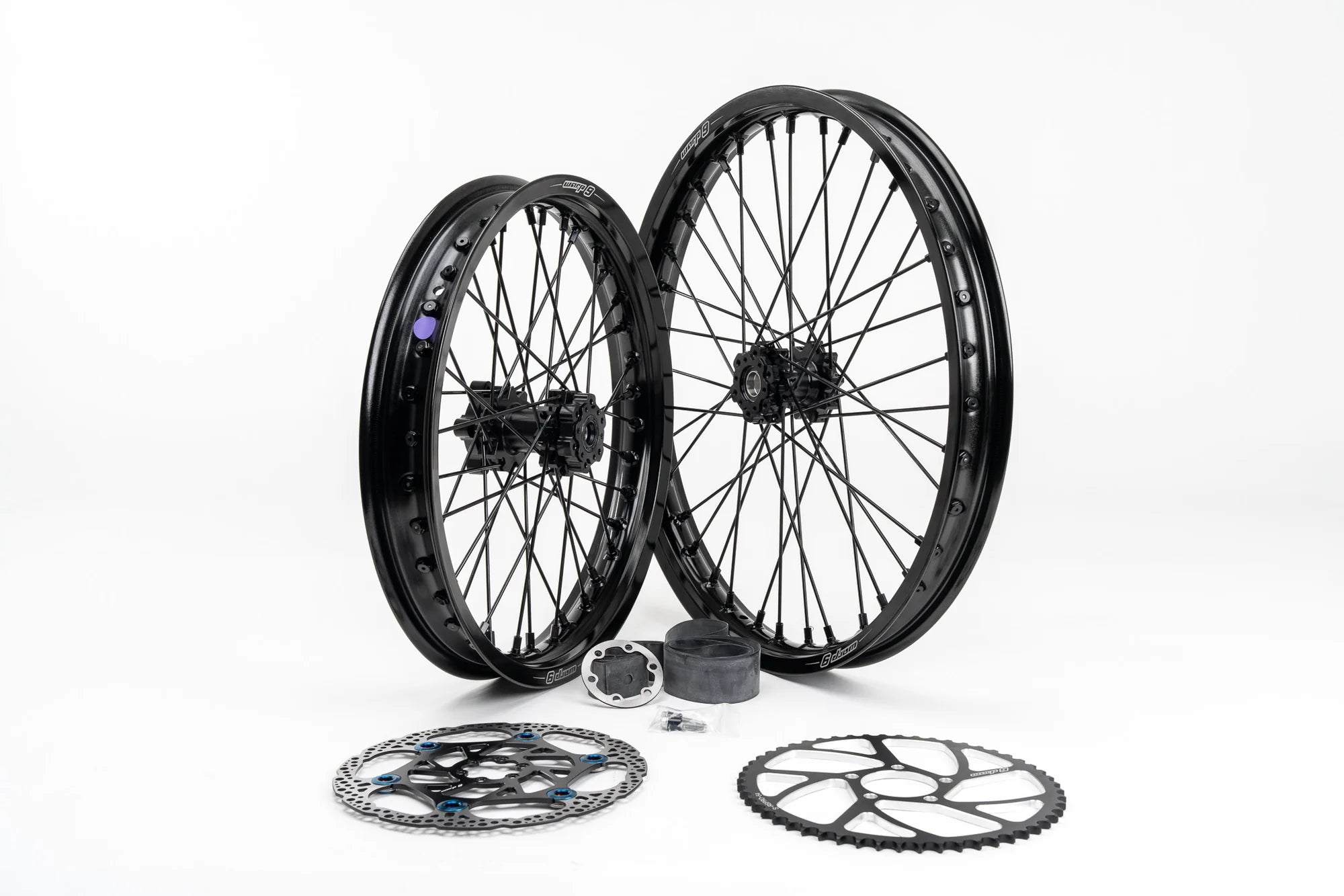 Warp 9 16/19 wheel set for Surron LBX — front wheel view