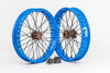 Close-up of precision-laced spokes on a Warp 9 Talaria supermoto wheel