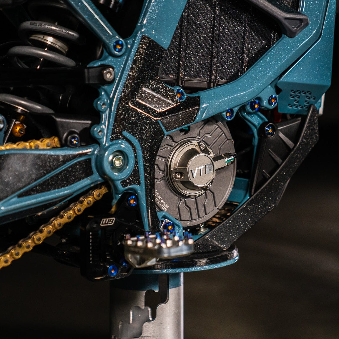 Surron Ultra Bee frame guard decal — close-up