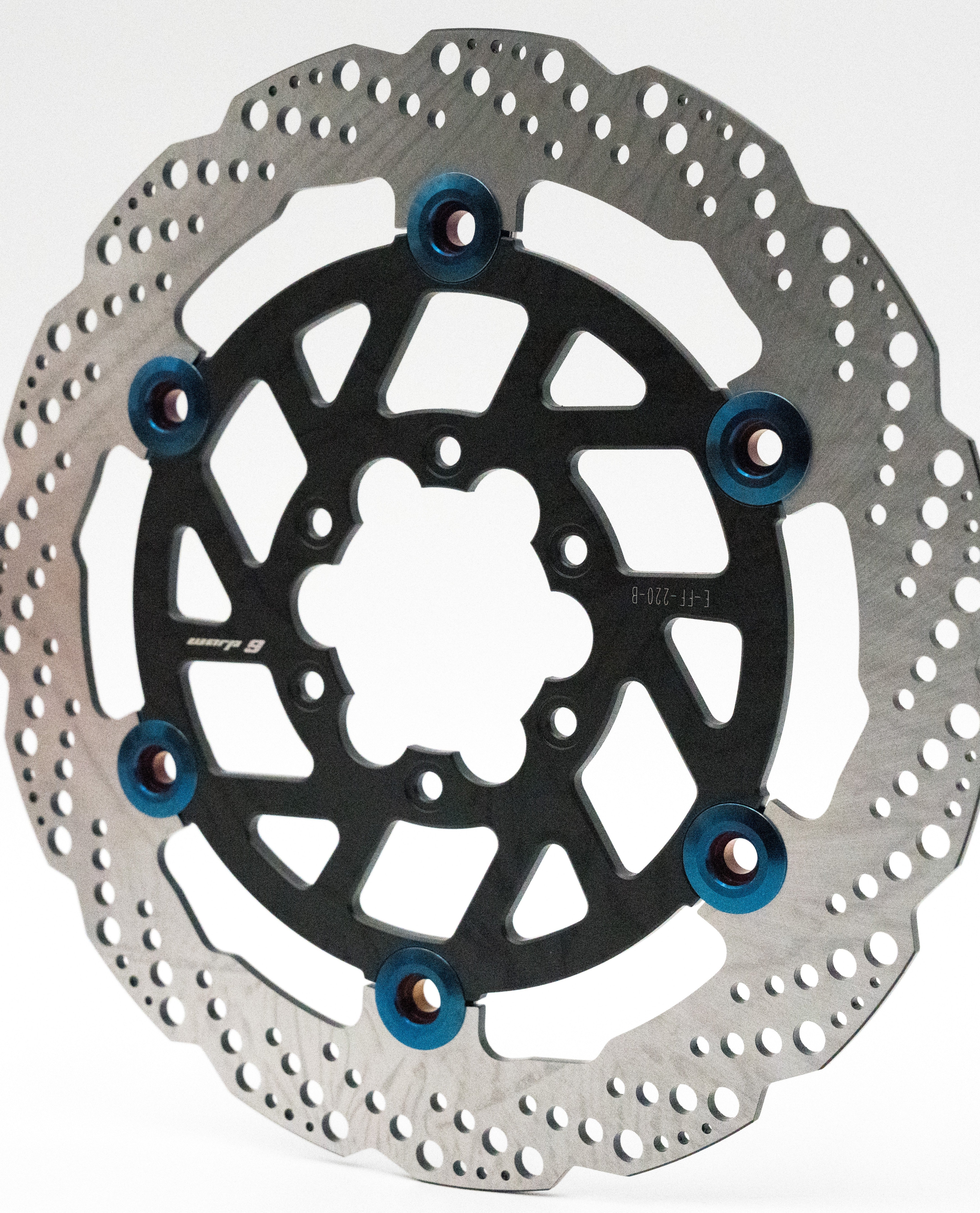 Warp 9 floating brake rotor with anodized blue titanium rivets for E-Ride Pro