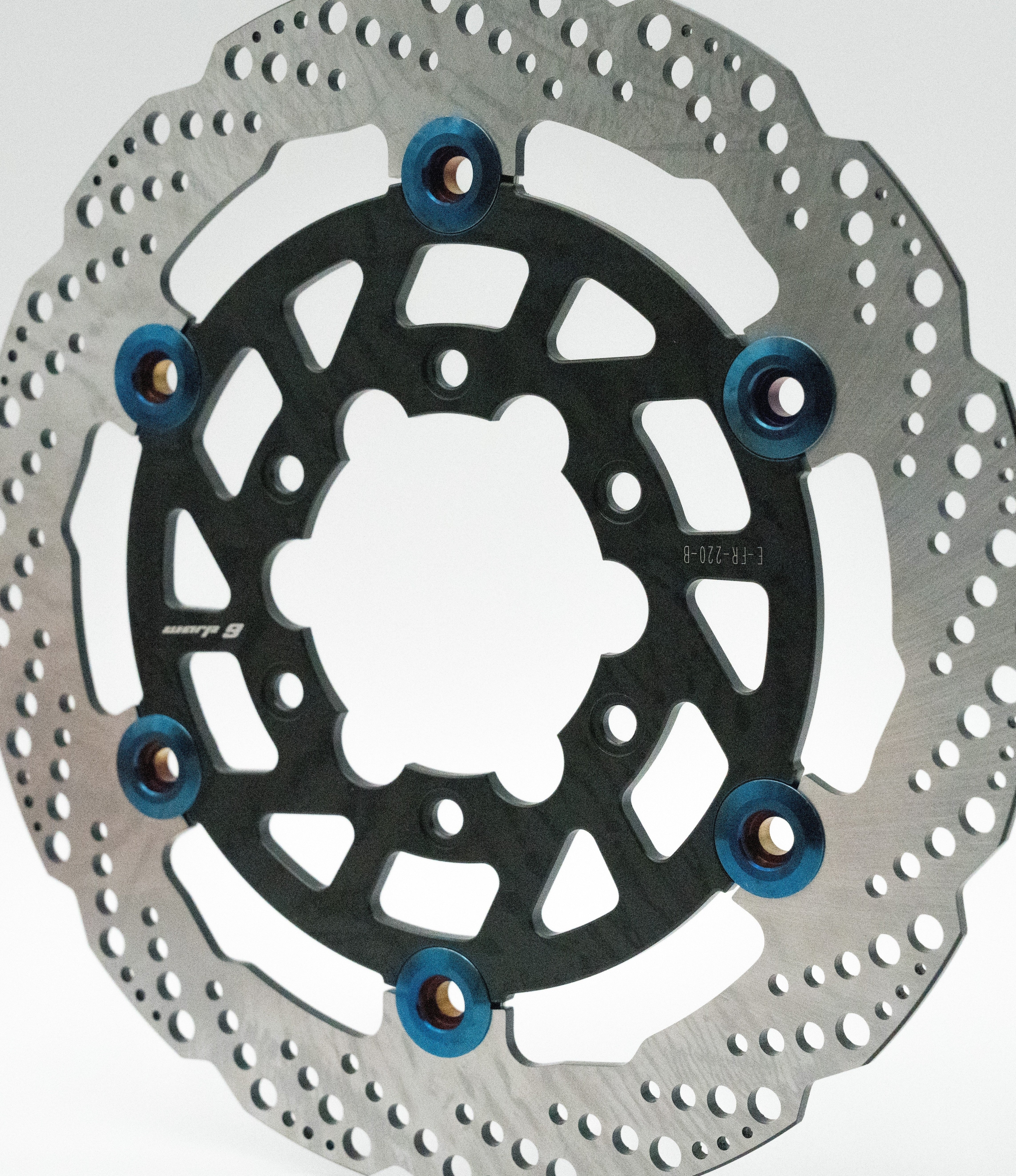 Warp 9 E-Ride Pro rear brake rotor showing vented braking surface