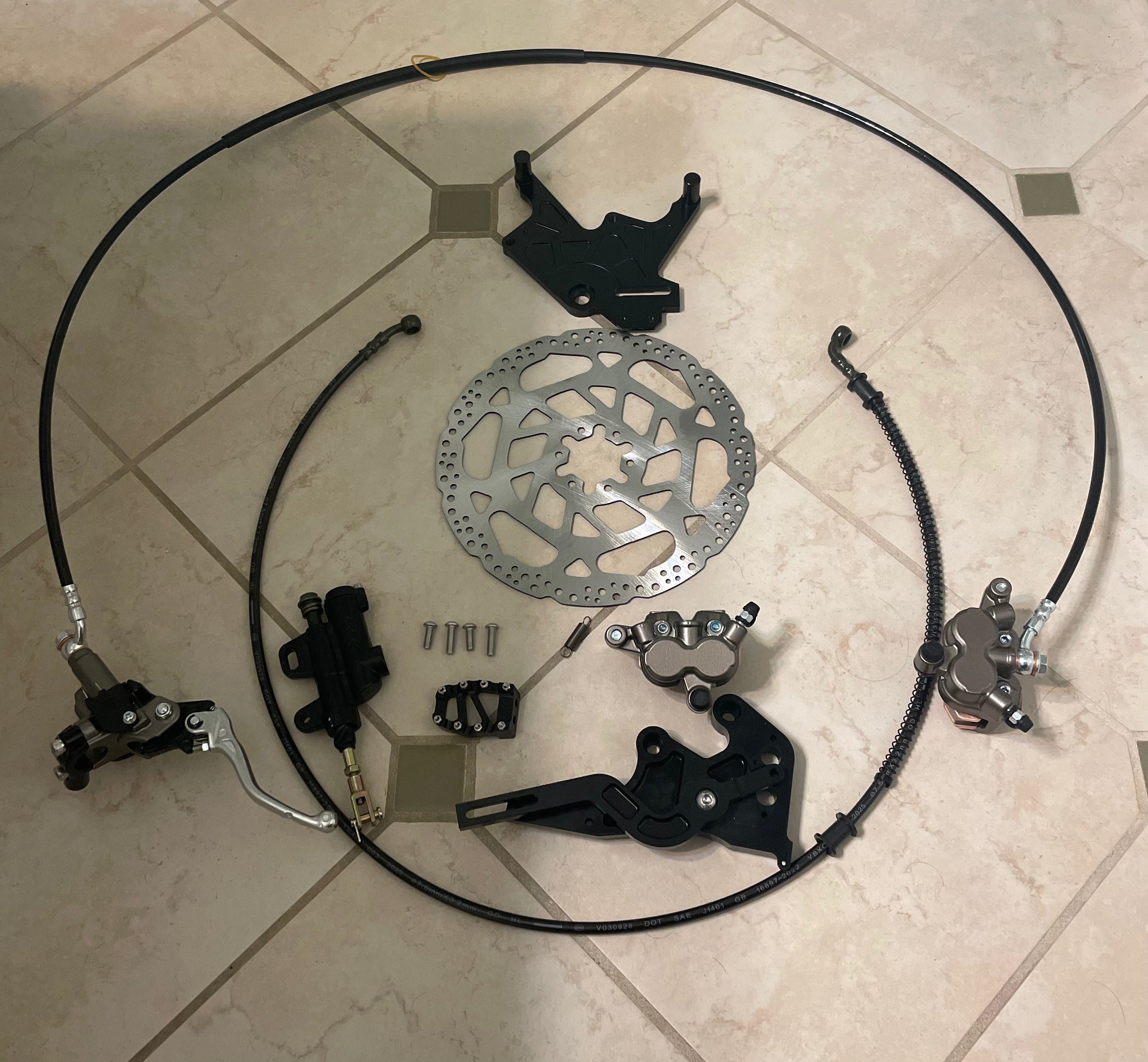 Moto handbrake and footbrake kit for Surron LBX and E-Ride Pro 2.0 — full kit contents