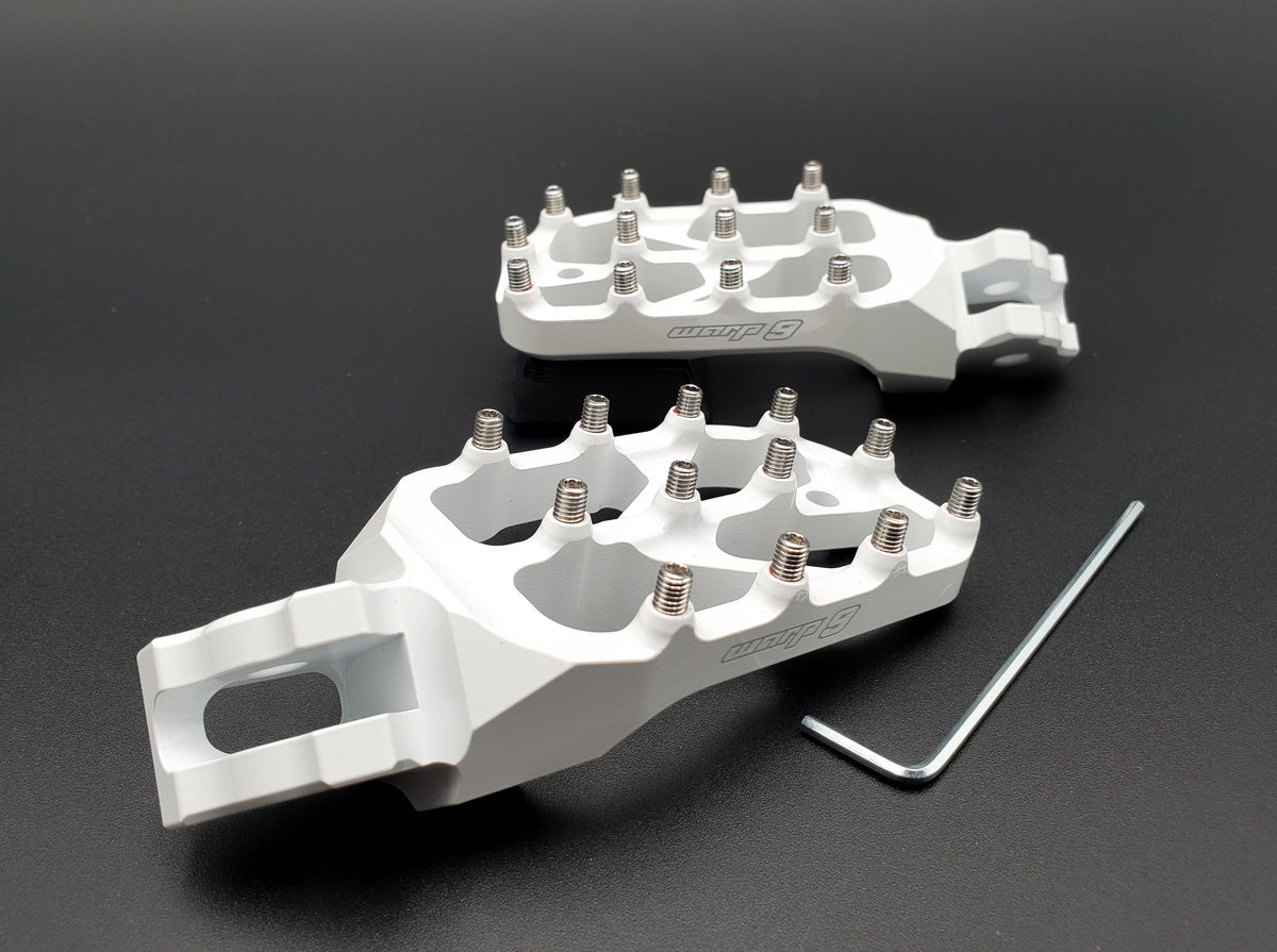 Silver Warp 9 Elite foot pegs for the Talaria Sting and Altis Sigma