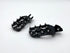 Black anodized Warp 9 Elite foot pegs with stainless teeth