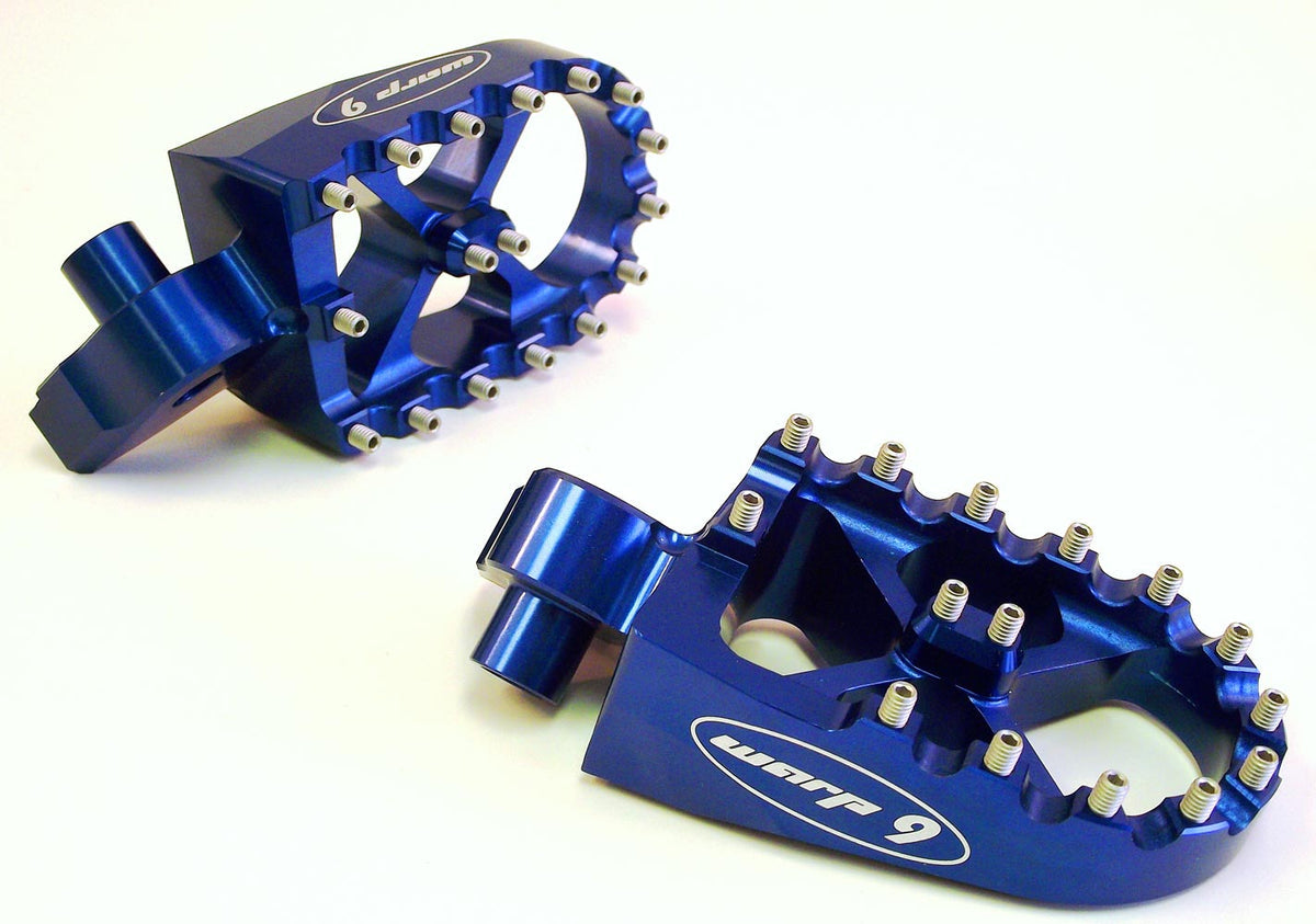 Blue anodized Warp 9 foot pegs showing the 57 by 87mm platform