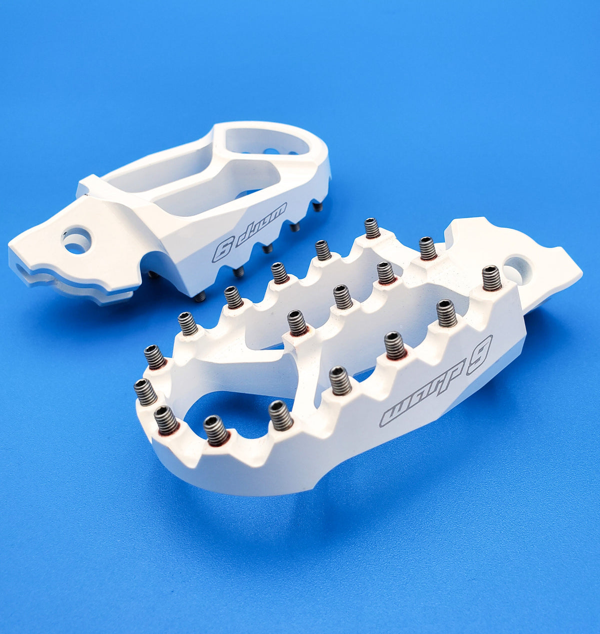 White anodized Warp 9 foot pegs for the Talaria Sting and Altis Sigma
