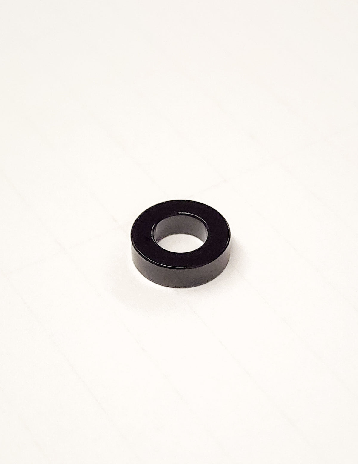 Warp 9 CNC-machined seat spacer for the Sur-Ron Ultra Bee