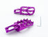 Gold anodized Warp 9 Elite foot pegs showing the 89 by 58mm platform