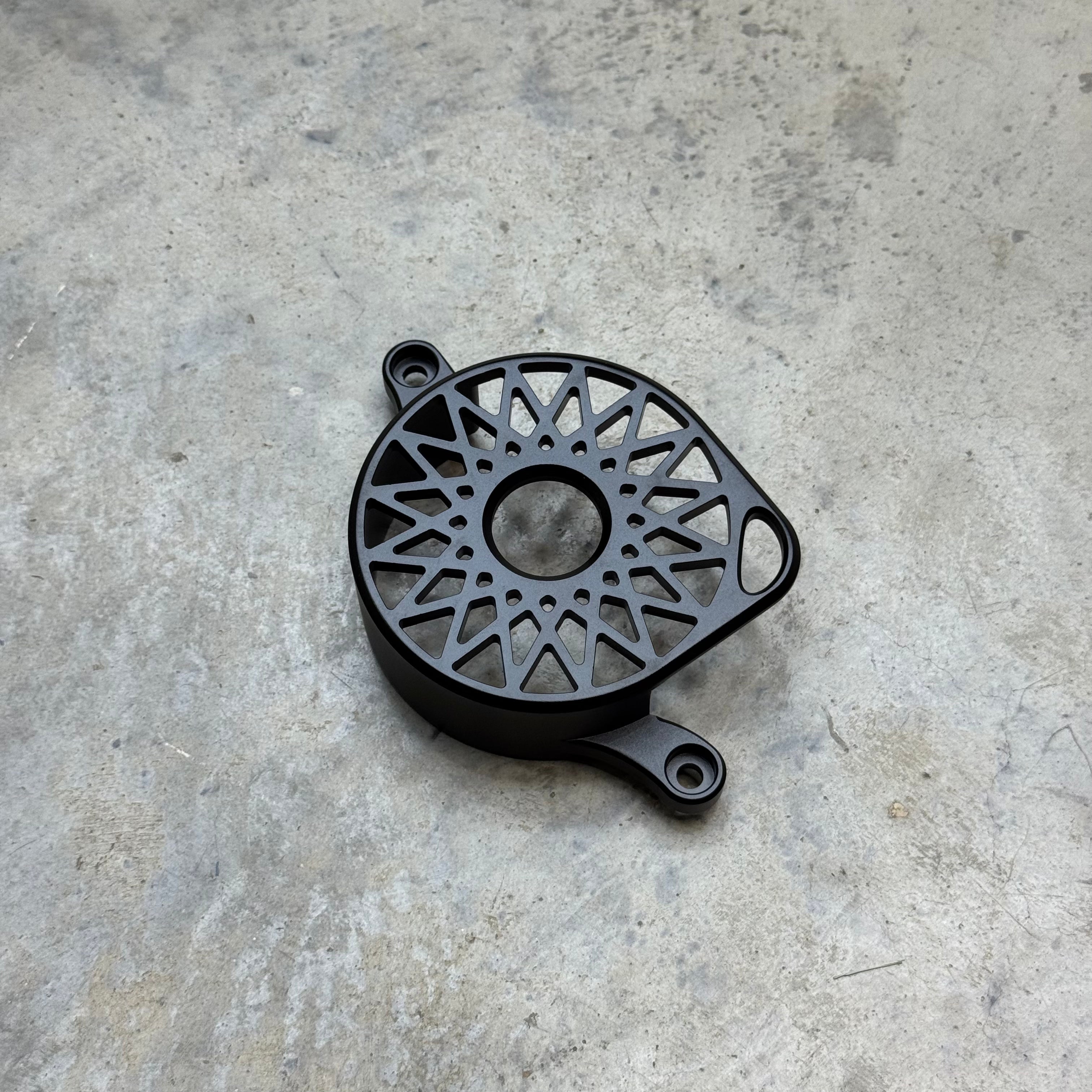 CNC-milled 6061 aluminum motor cover installed on Sur-Ron Ultra Bee