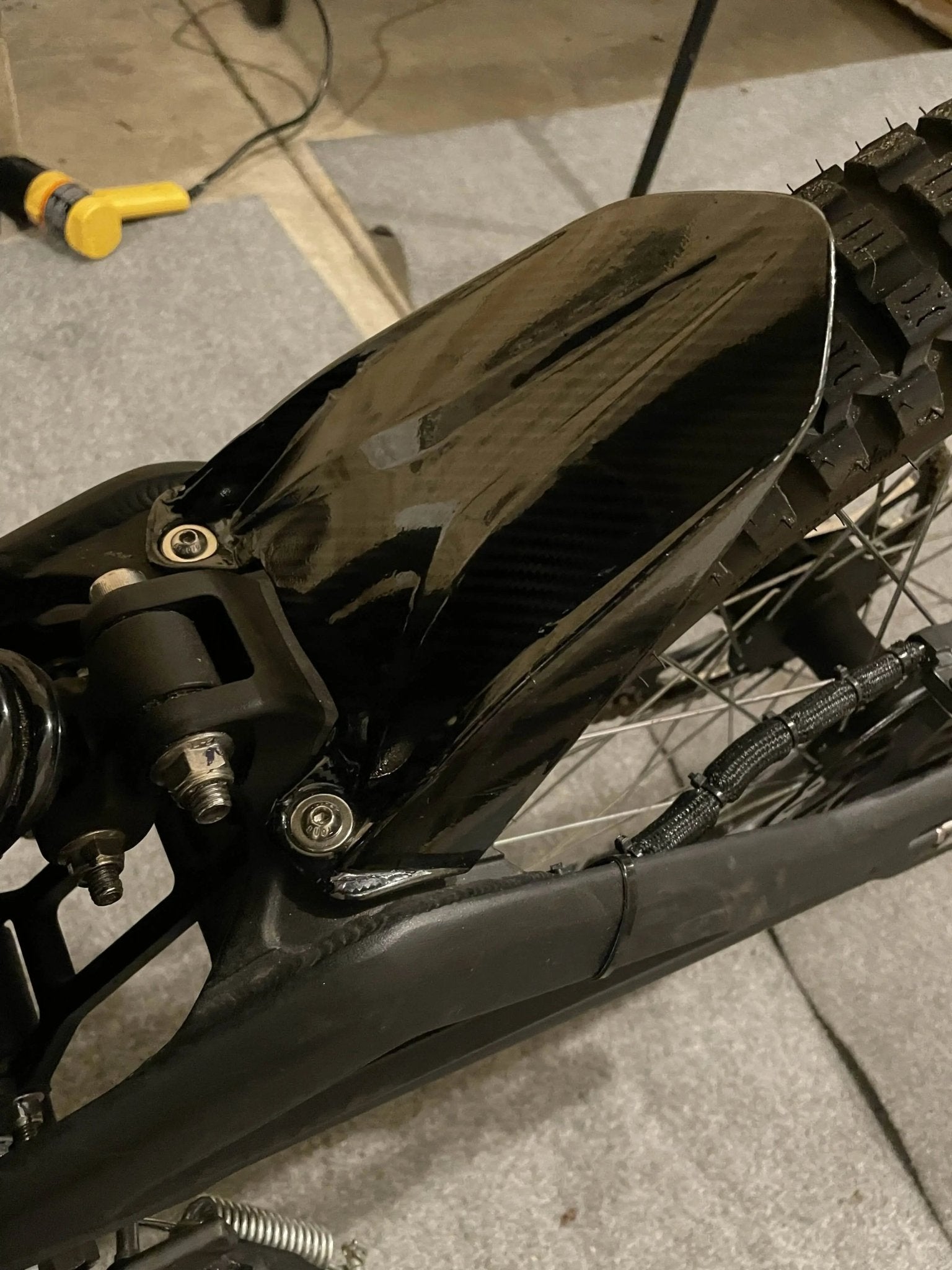 Carbon fiber motor cover wrap on Talaria MX4