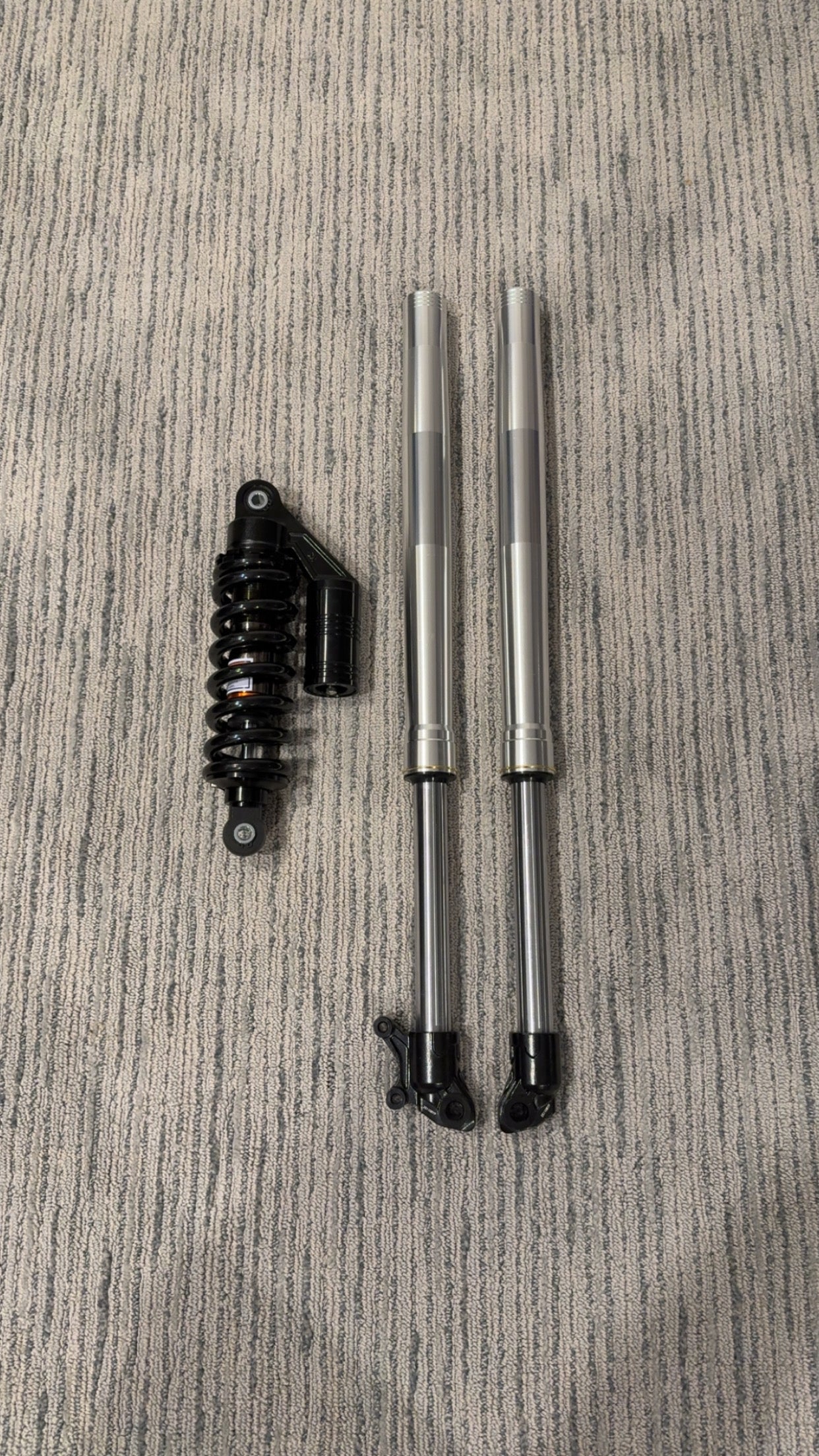Lower fork legs of the Tuttio/Yozma suspension upgrade