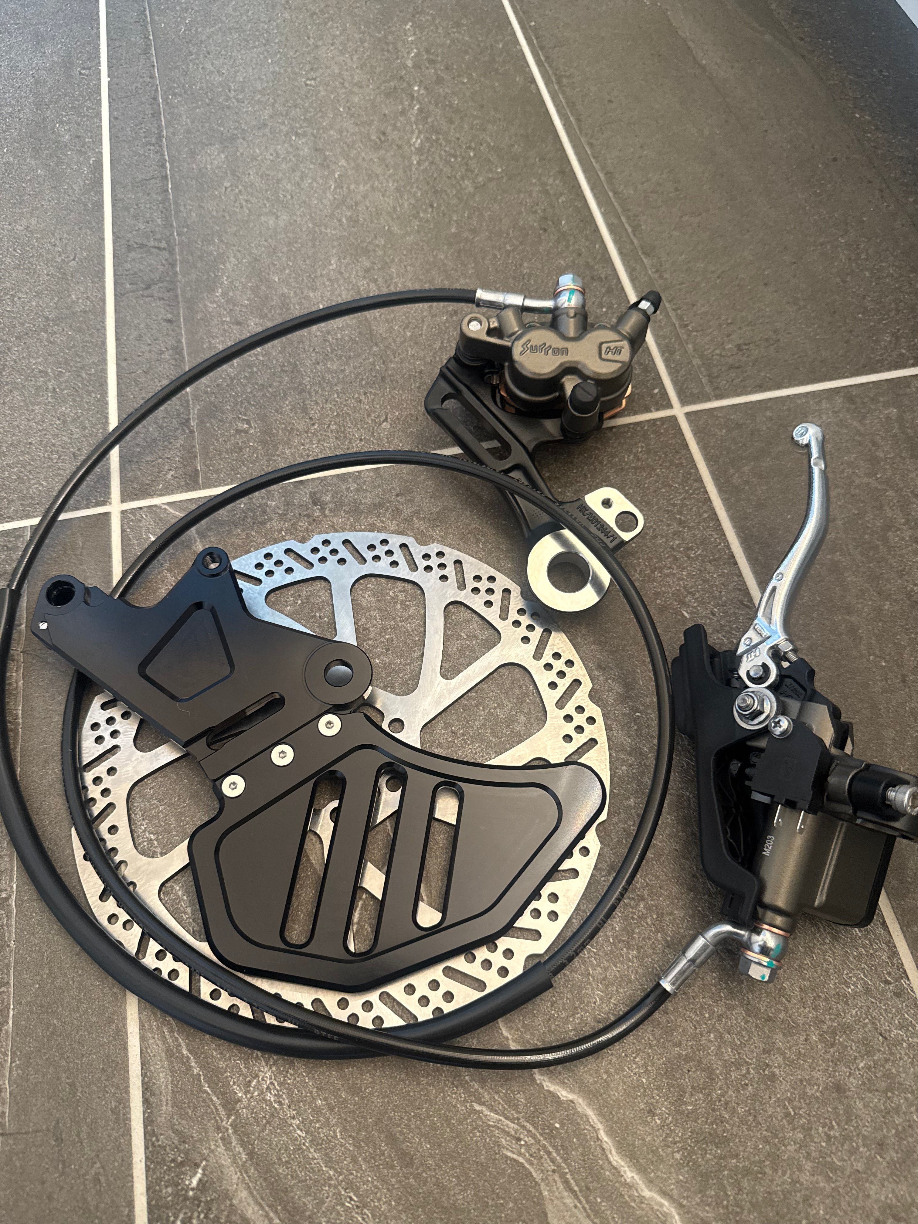 Master cylinder and brake assembly for Talaria rear brake upgrade
