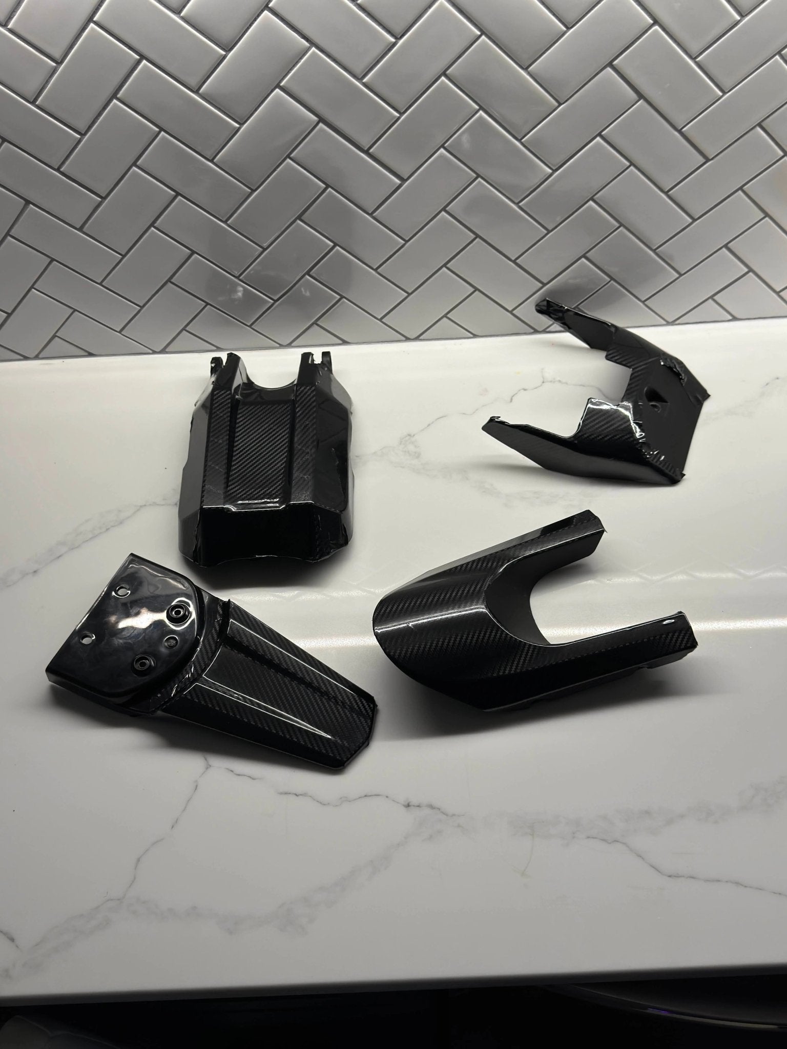E-Ride Pro carbon fiber wrap kit applied to plastics