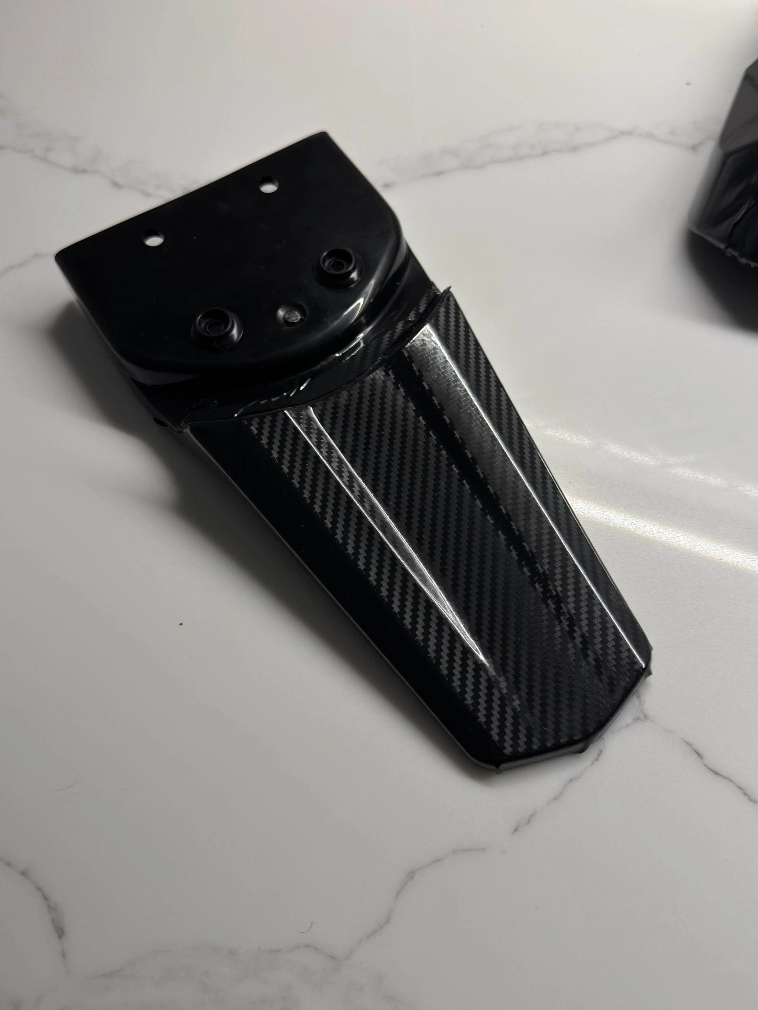 Close-up of carbon fiber weave on E-Ride Pro wrap