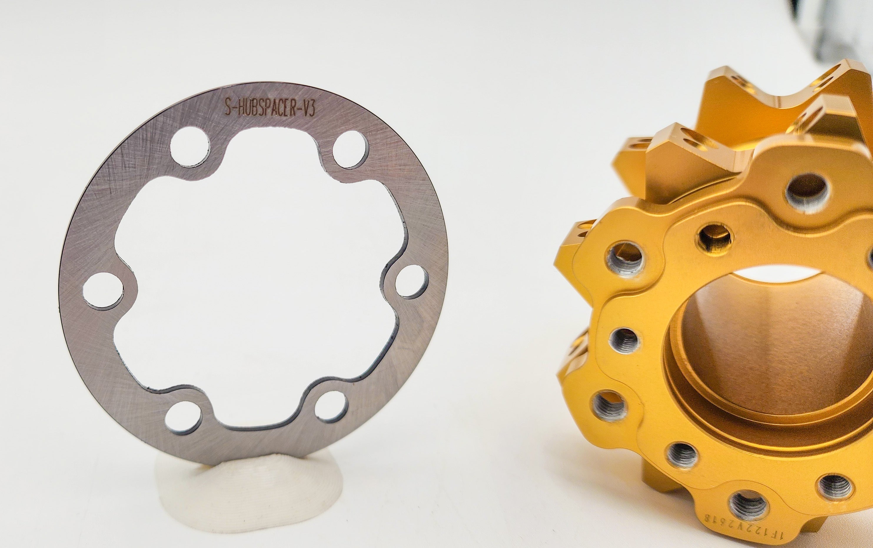 Bolt-pattern adapter spacer for Warp 9 V3 hubs
