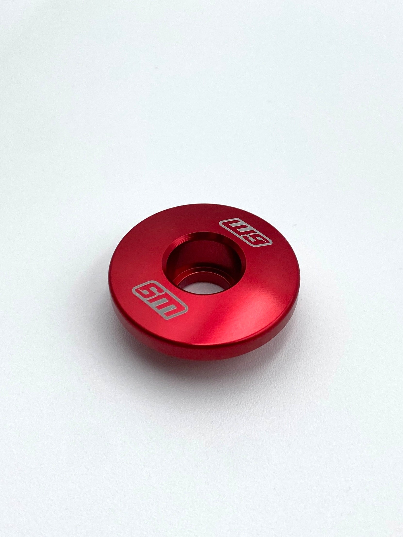 Warp 9 steer lock end cap fitted to a Talaria Sting cockpit