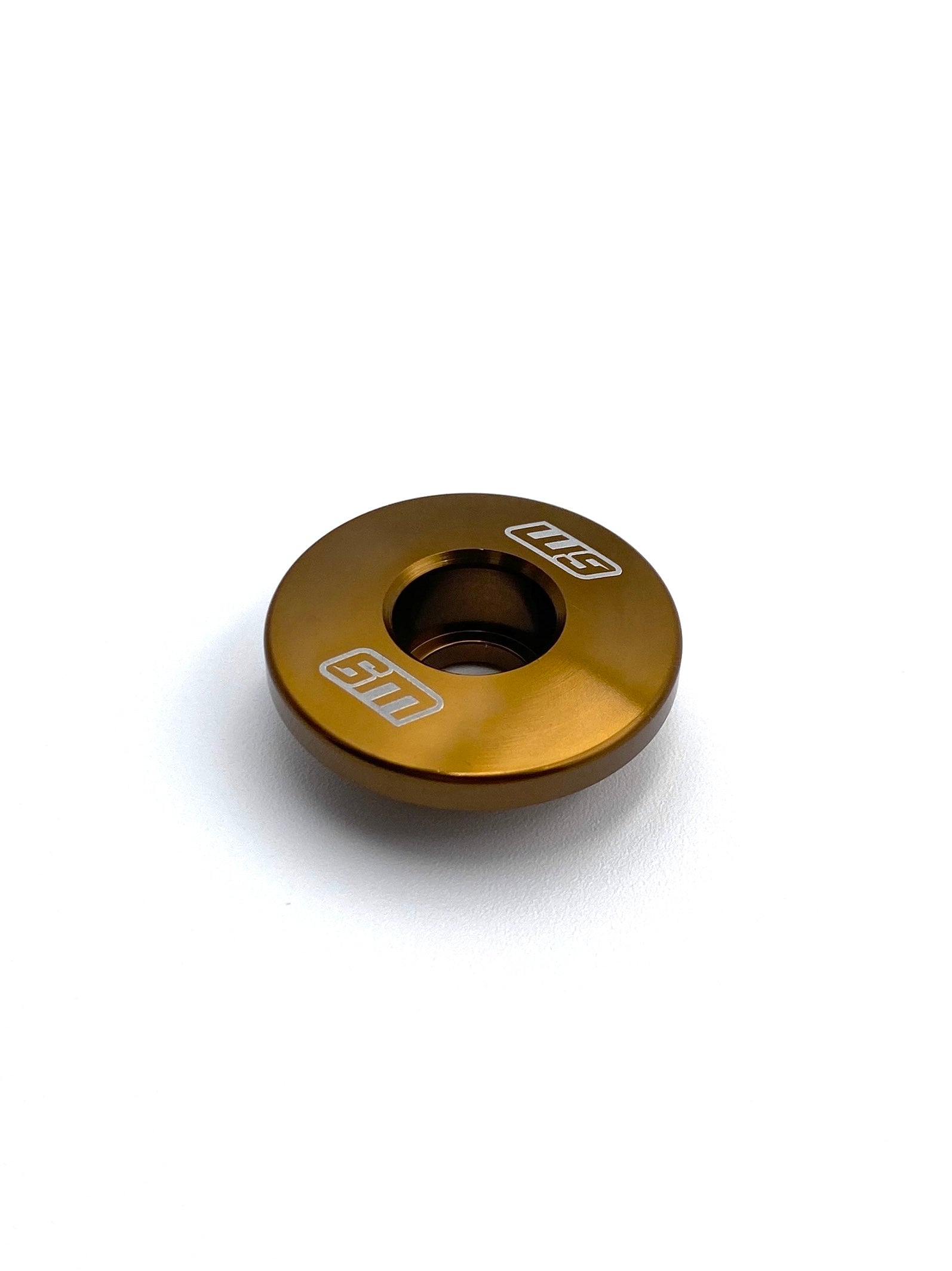 Detail view of Warp 9 anodized aluminum steer lock replacement cap