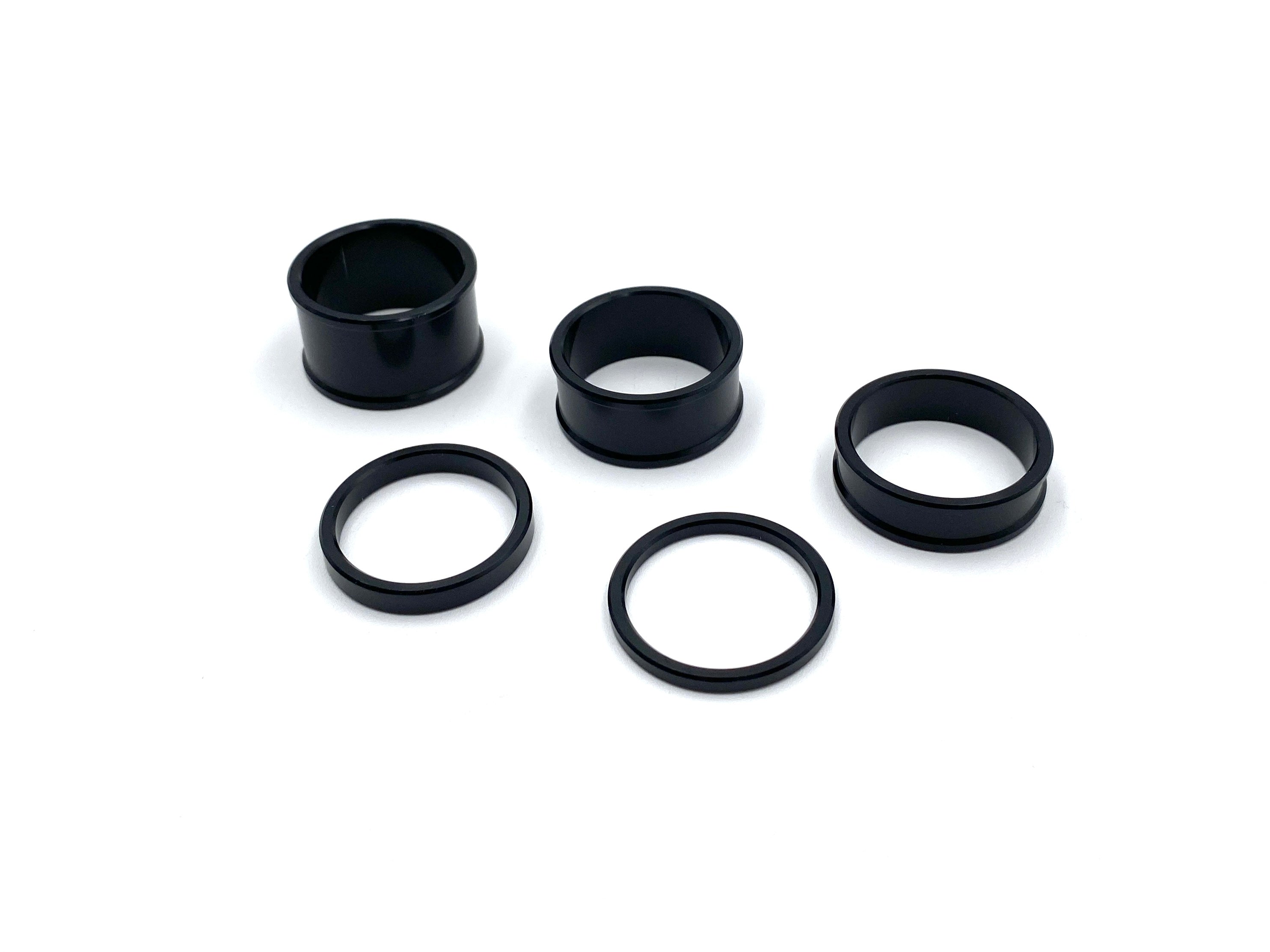 Warp 9 five-piece stem lock spacer kit with 3mm to 20mm spacers for Sur-Ron and Talaria steer locks