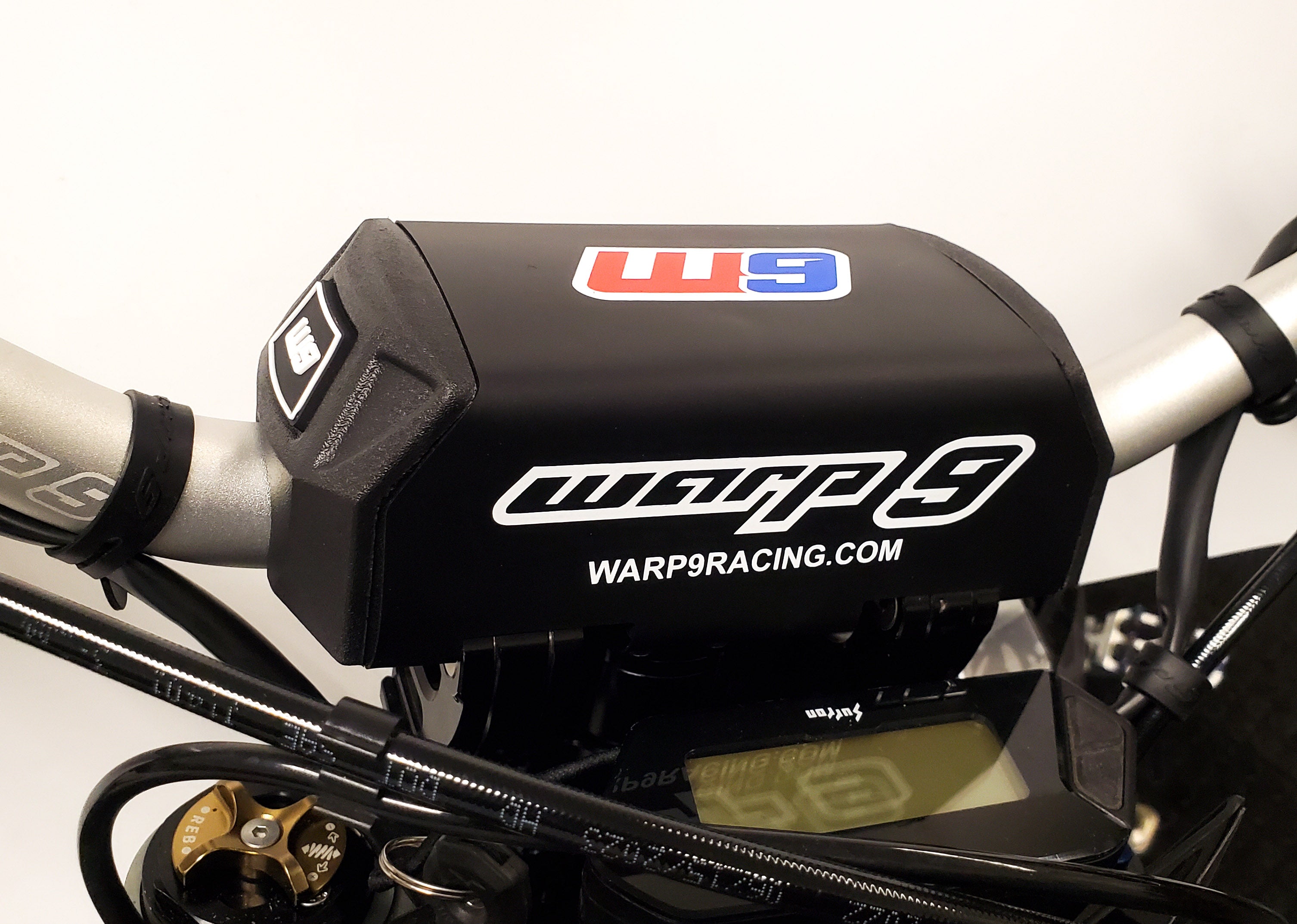 High-density foam handlebar pad with Warp 9 graphics