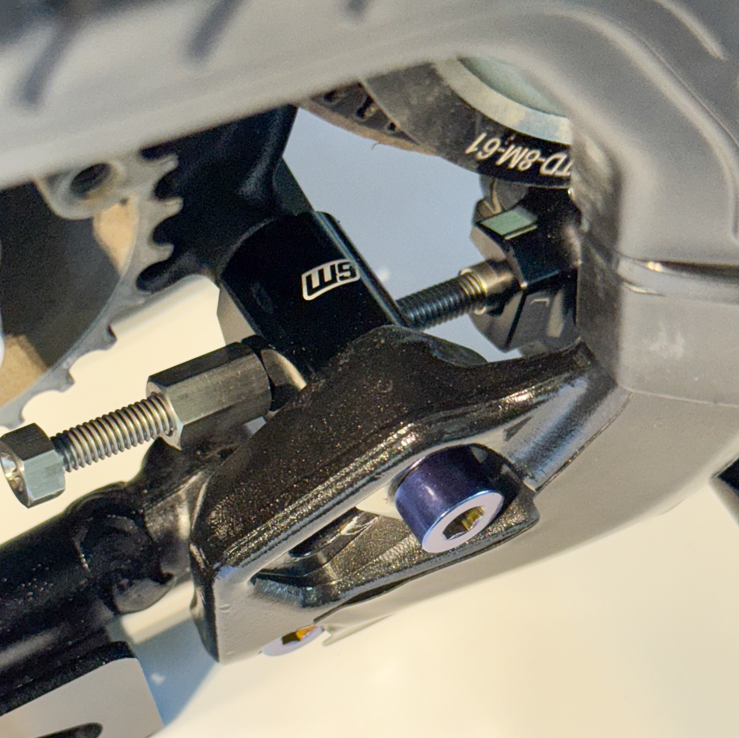 CNC motor adjuster replacing the OEM plastic unit on the Ultra Bee
