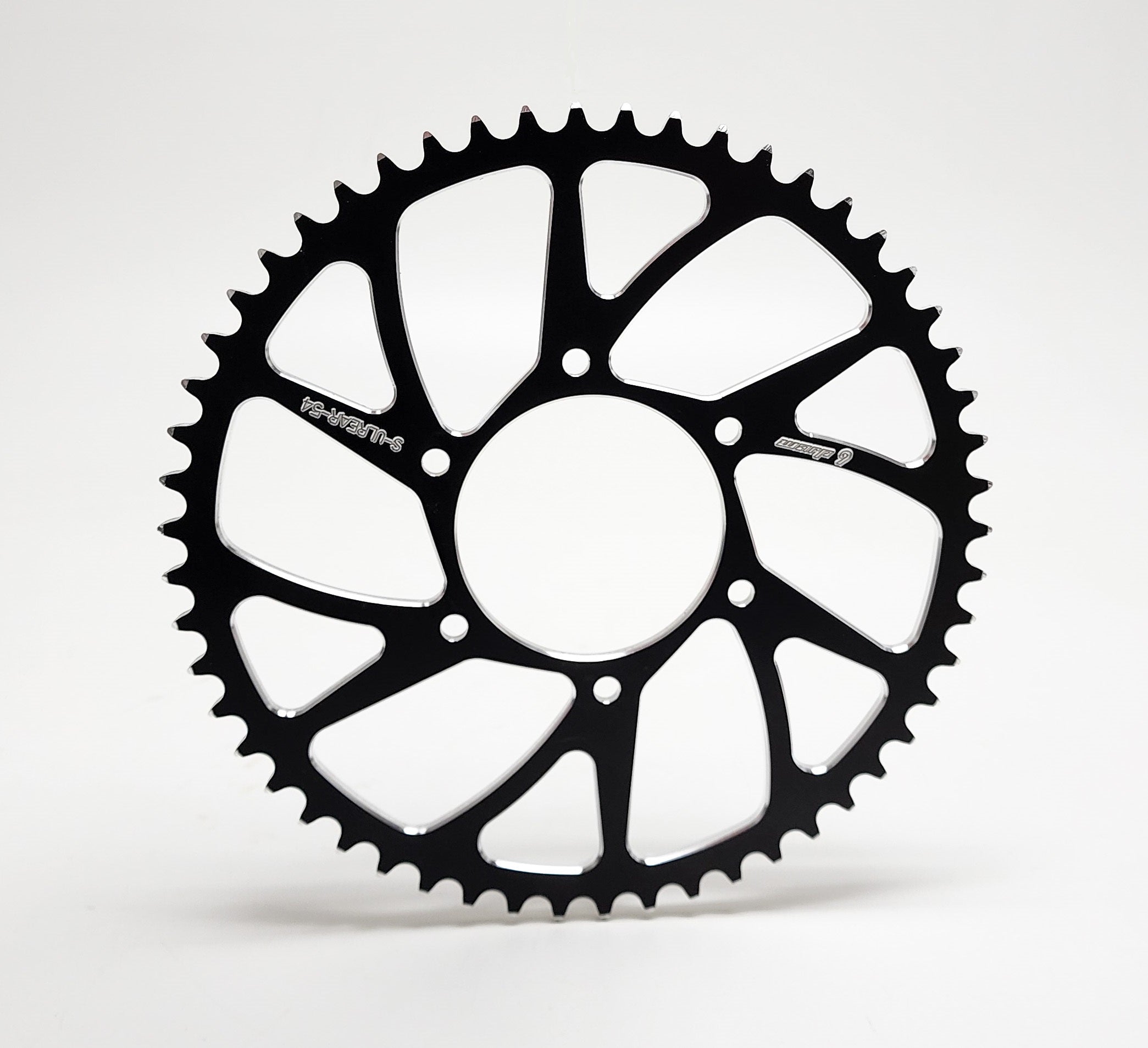 Black anodized 520 rear sprocket showing tooth profile