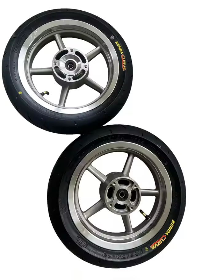 Silver supermoto wheel with rotor mounted, side view
