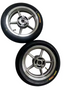 Silver supermoto wheel with rotor mounted, side view