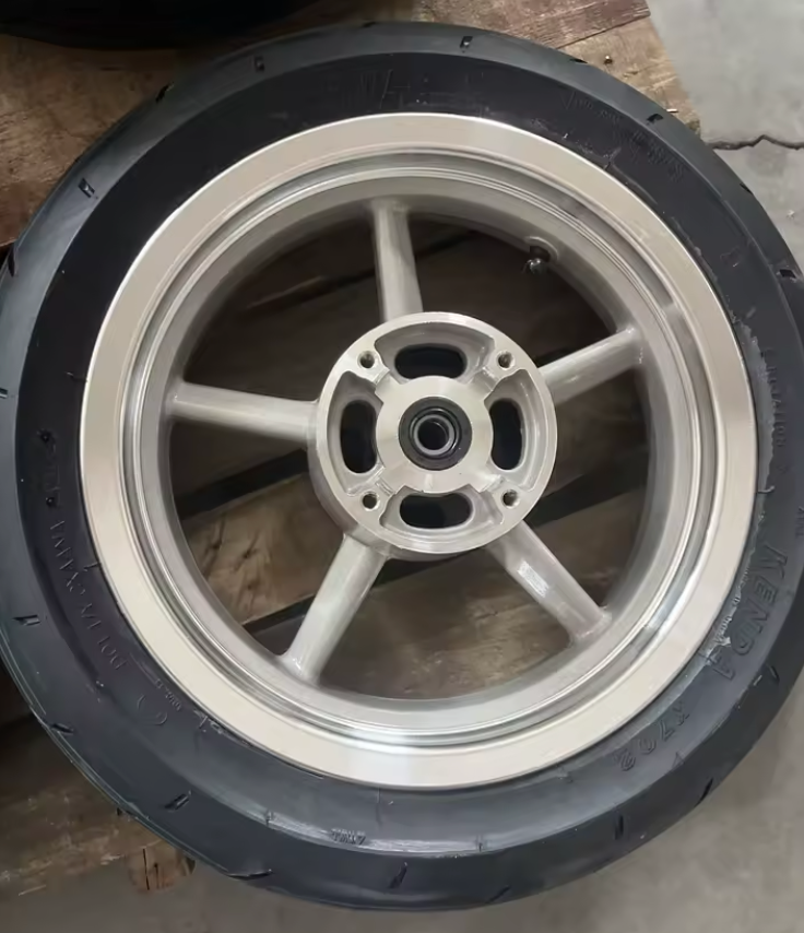 Supermoto wheel set showing sprocket and rotor included