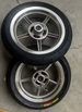 Silver supermoto wheel hub and mounting hardware detail