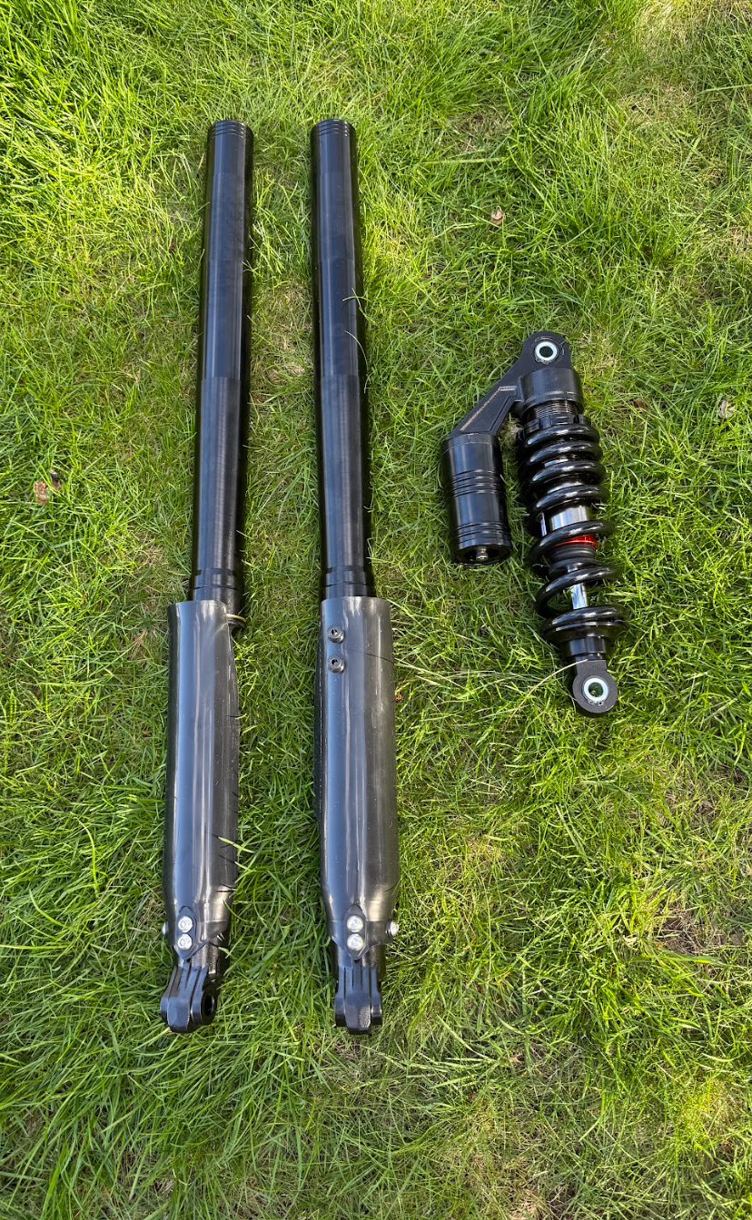 Upgraded front forks and rear shock suspension kit for the Tuttio/Yozma