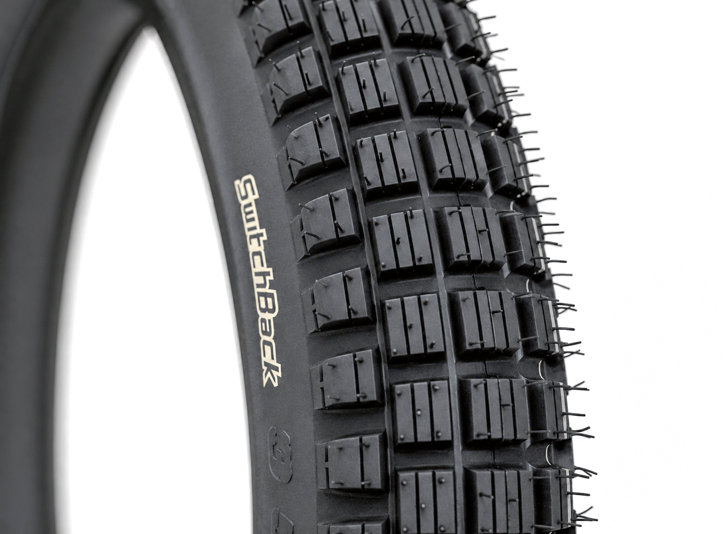 Tread detail of Warp 9 SwitchBack 16 inch knobby dual-purpose tire