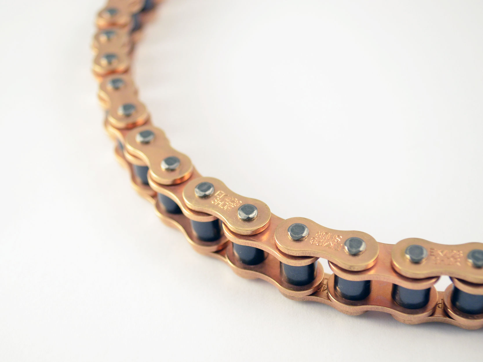 Warp 9 EK 428 gold e-moto chain with quad-staked pins, 120 links