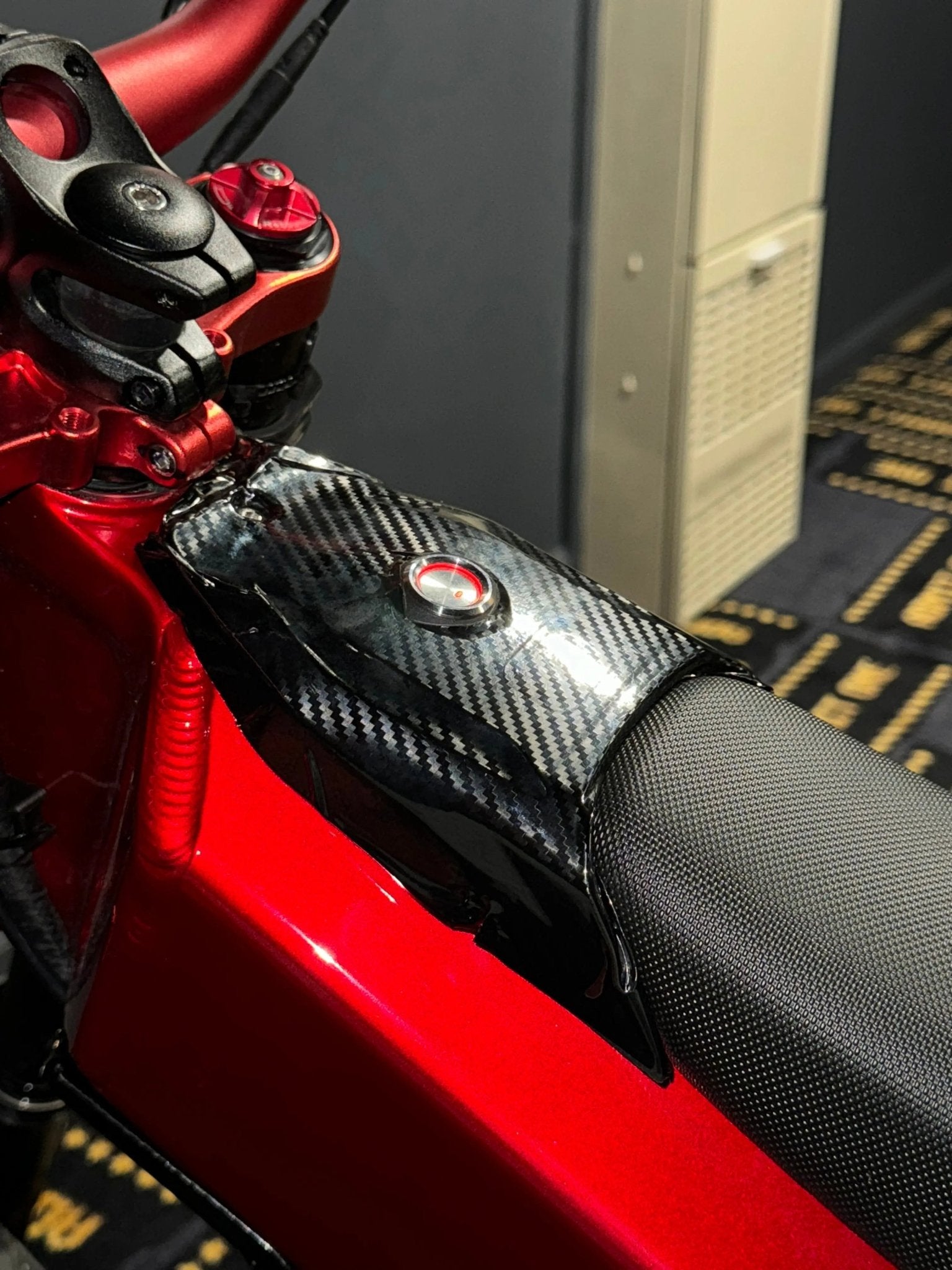 Talaria XXX side panel finished in carbon fiber wrap