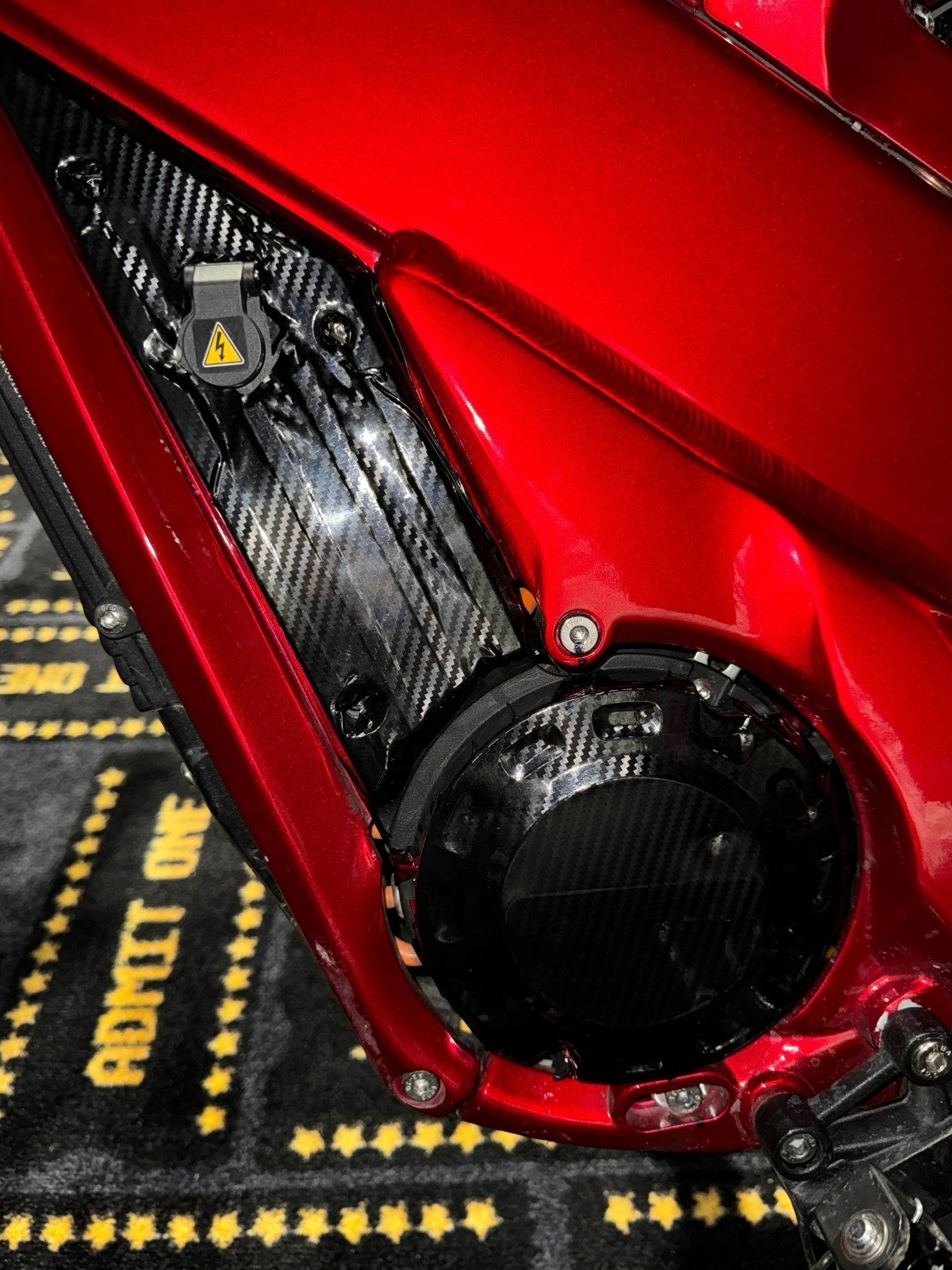 Talaria XXX rear fender wrapped in carbon fiber vinyl