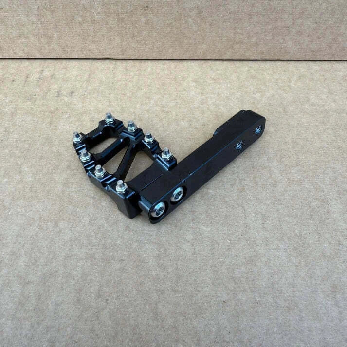 Foot brake extension for Surron Light Bee — installed on pedal